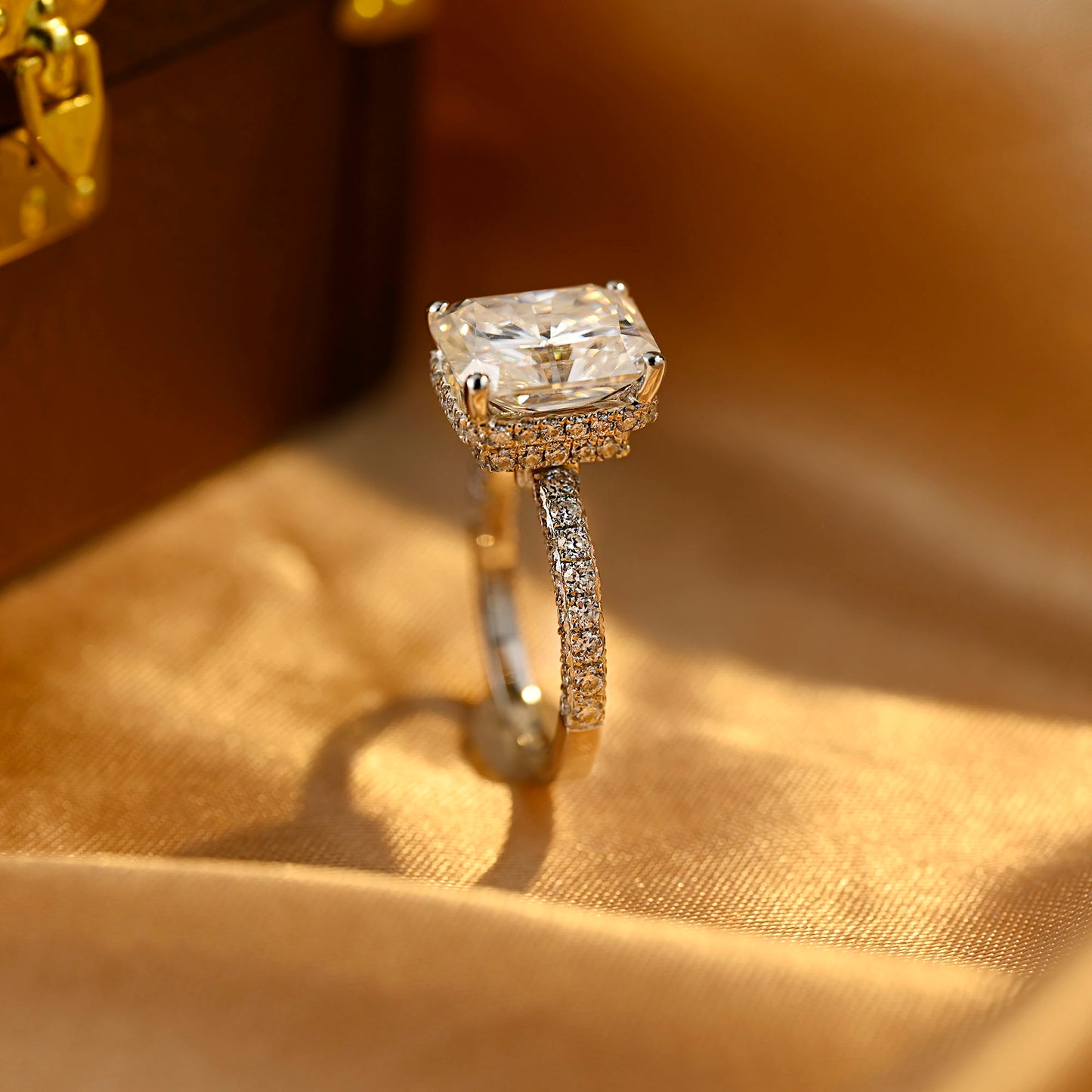 solid-gold-radiant-cut-moissanite-engagement-ring-three-raw-paved-ring