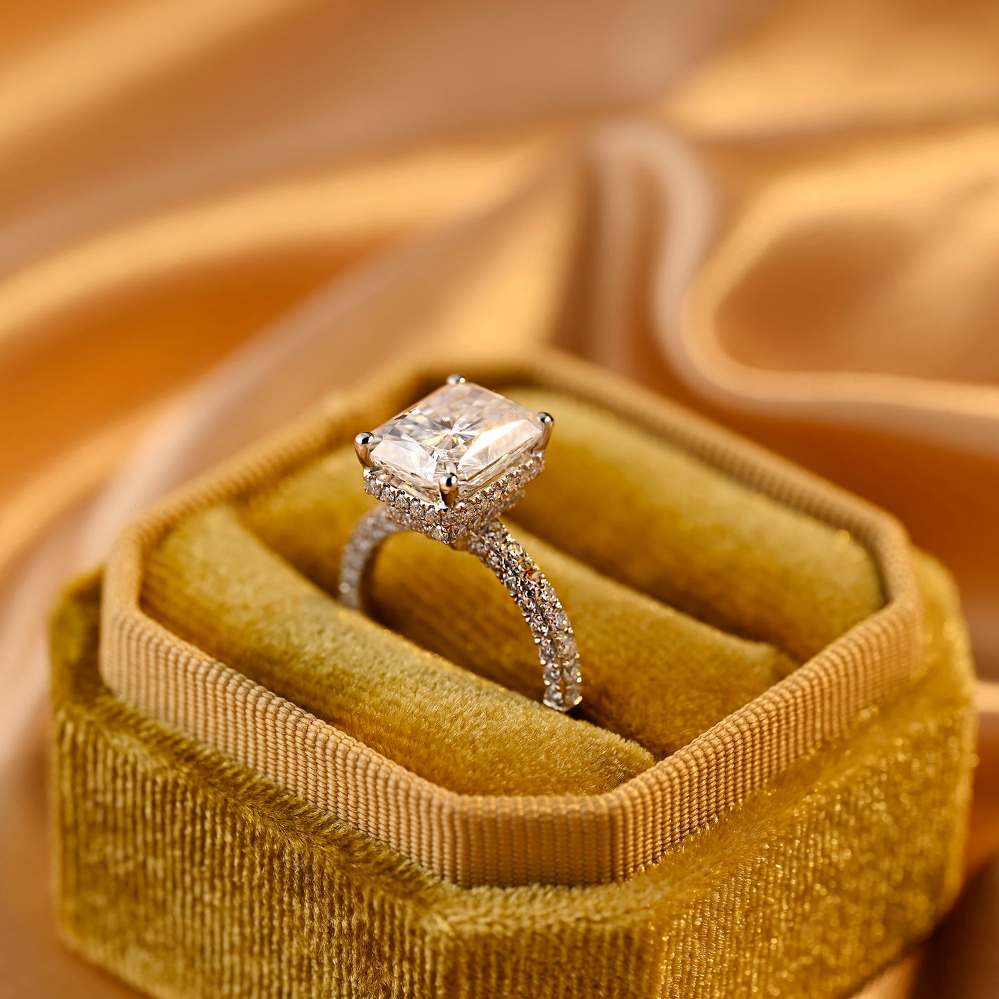 solid-gold-radiant-cut-moissanite-engagement-ring-three-raw-paved-ring