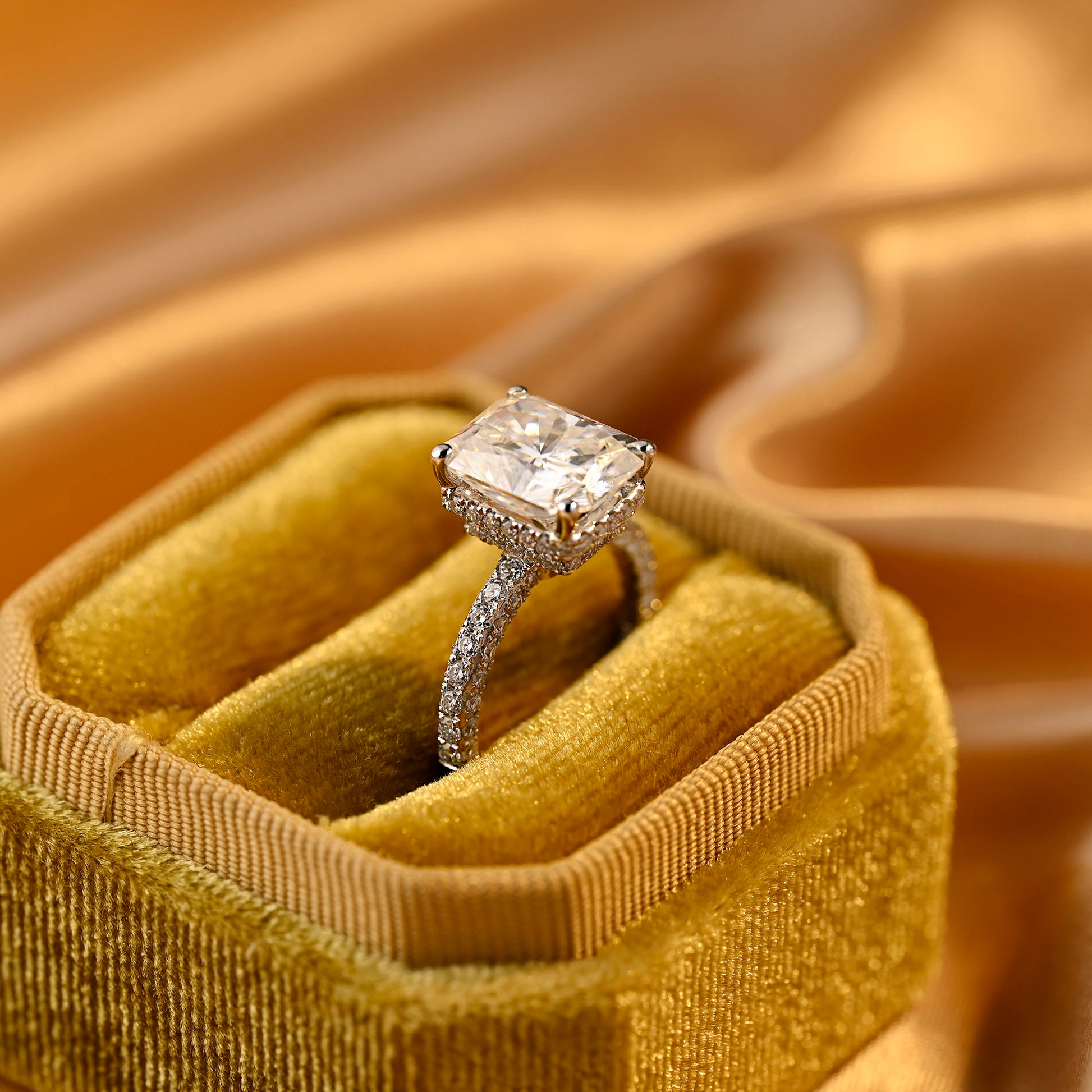 solid-gold-radiant-cut-moissanite-engagement-ring-three-raw-paved-ring