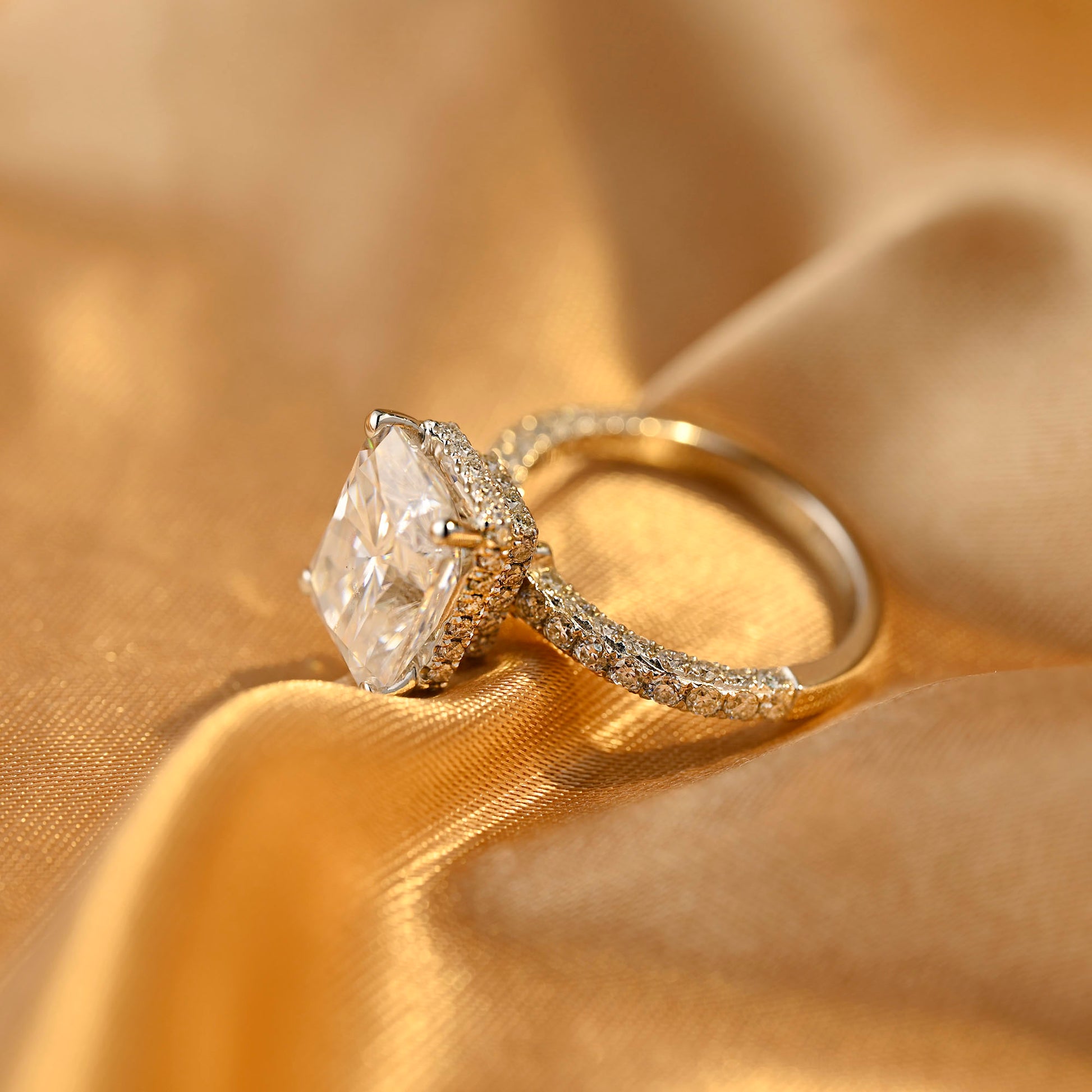 solid-gold-radiant-cut-moissanite-engagement-ring-three-raw-paved-ring