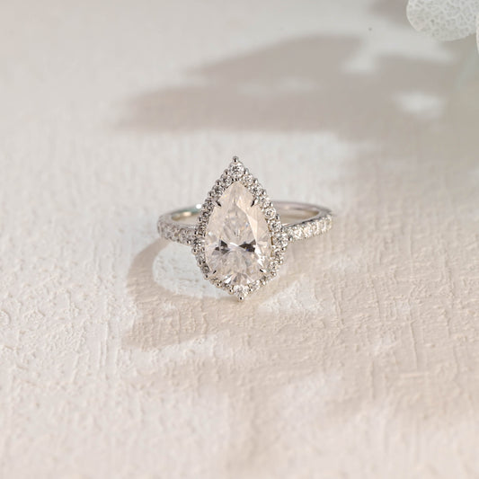 solid-gold-pear-cut-moissanite-engagement-ring-paved-halo-ring