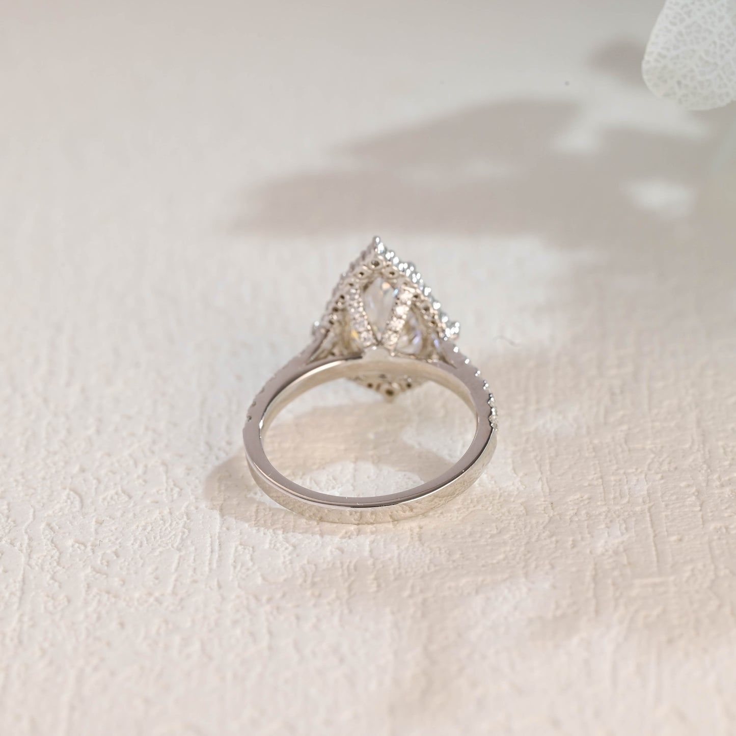 solid-gold-pear-cut-moissanite-engagement-ring-paved-halo-ring