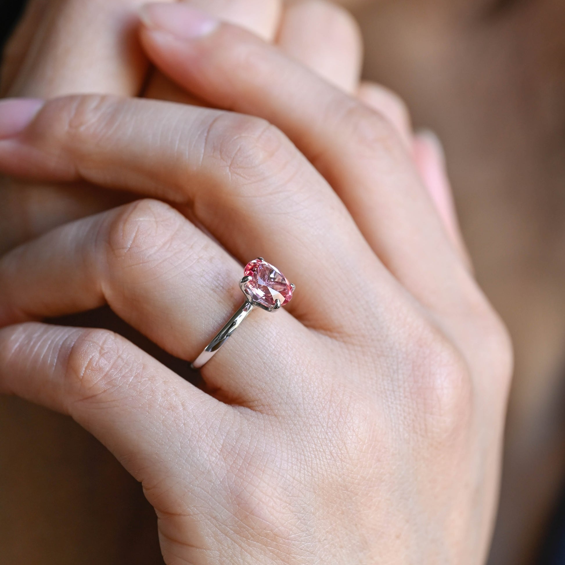 oval-cut-lab-grown-pink-sapphire-engagement-ring