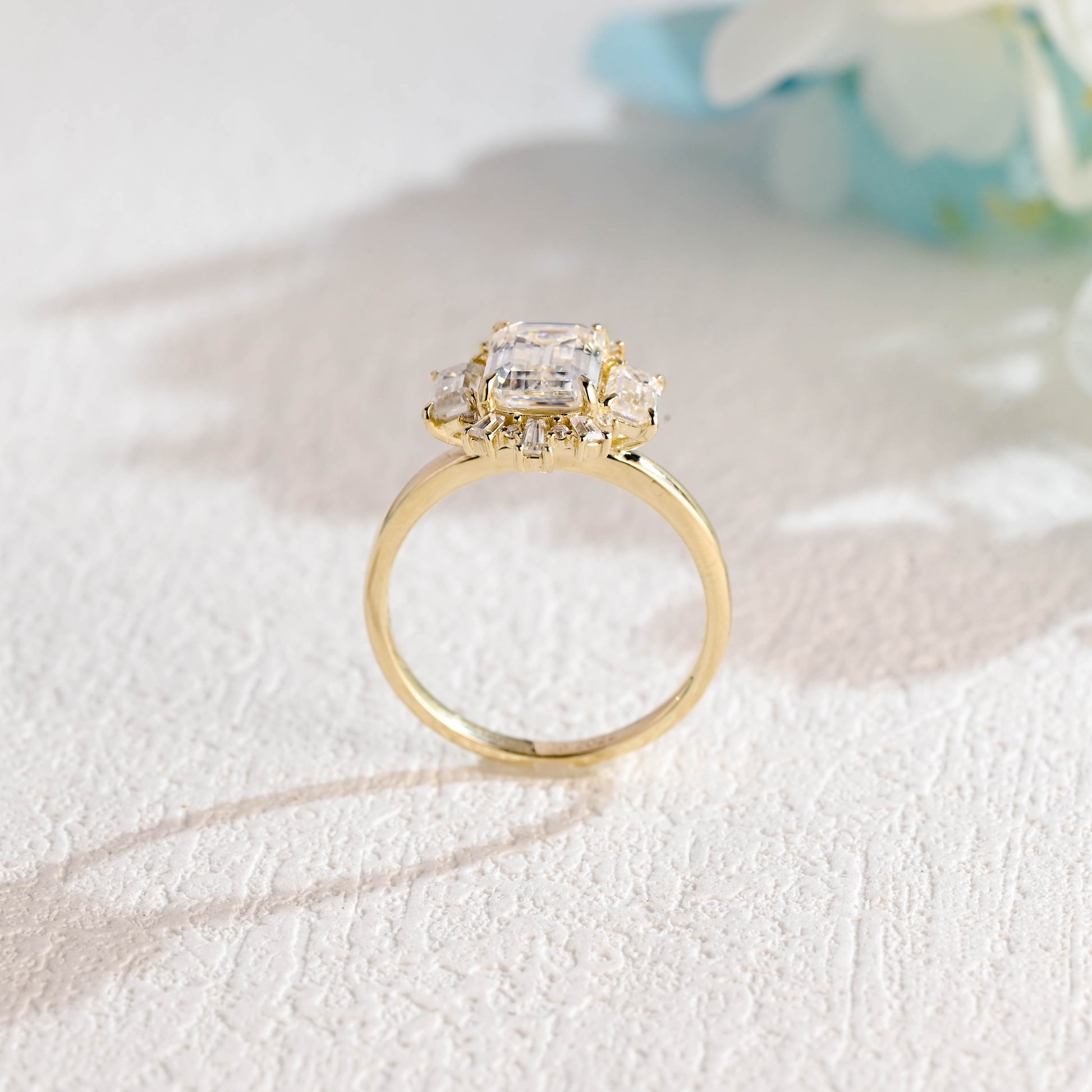 solid-gold-halo-emerald-cut-moissanite-engagement-ring