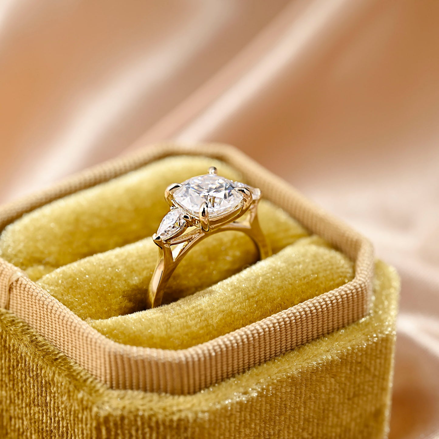 solid-gold-cushion-cut-moissanite-engagement-ring-three-stone-ring-pear-cut-ring