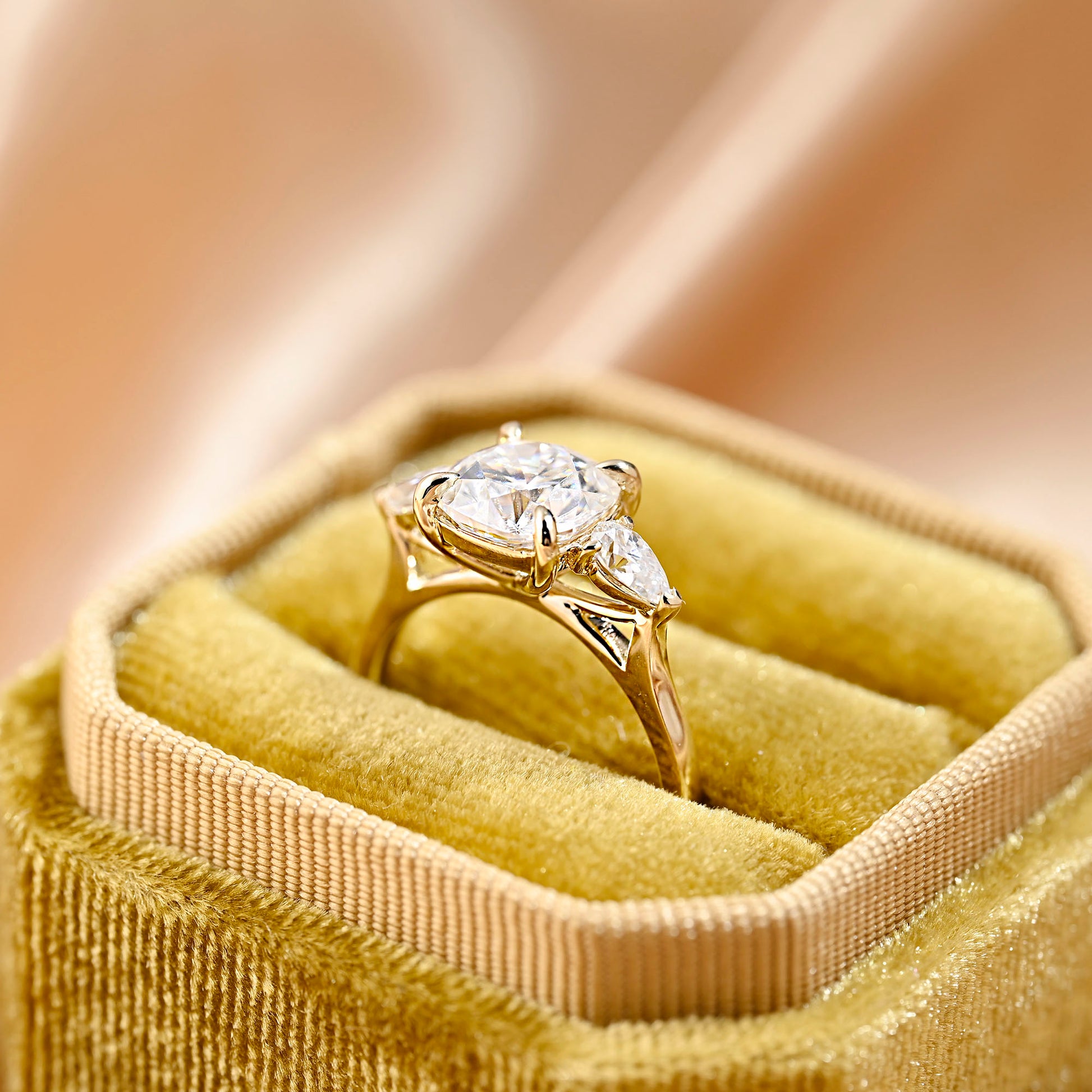 solid-gold-cushion-cut-moissanite-engagement-ring-three-stone-ring-pear-cut-ring