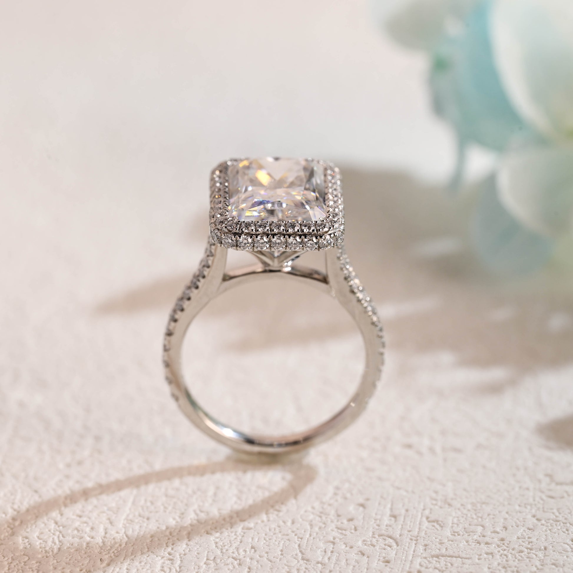 solid-gold-crushed-ice-radiant-cut-moissanite-engagement-ring-split-shank