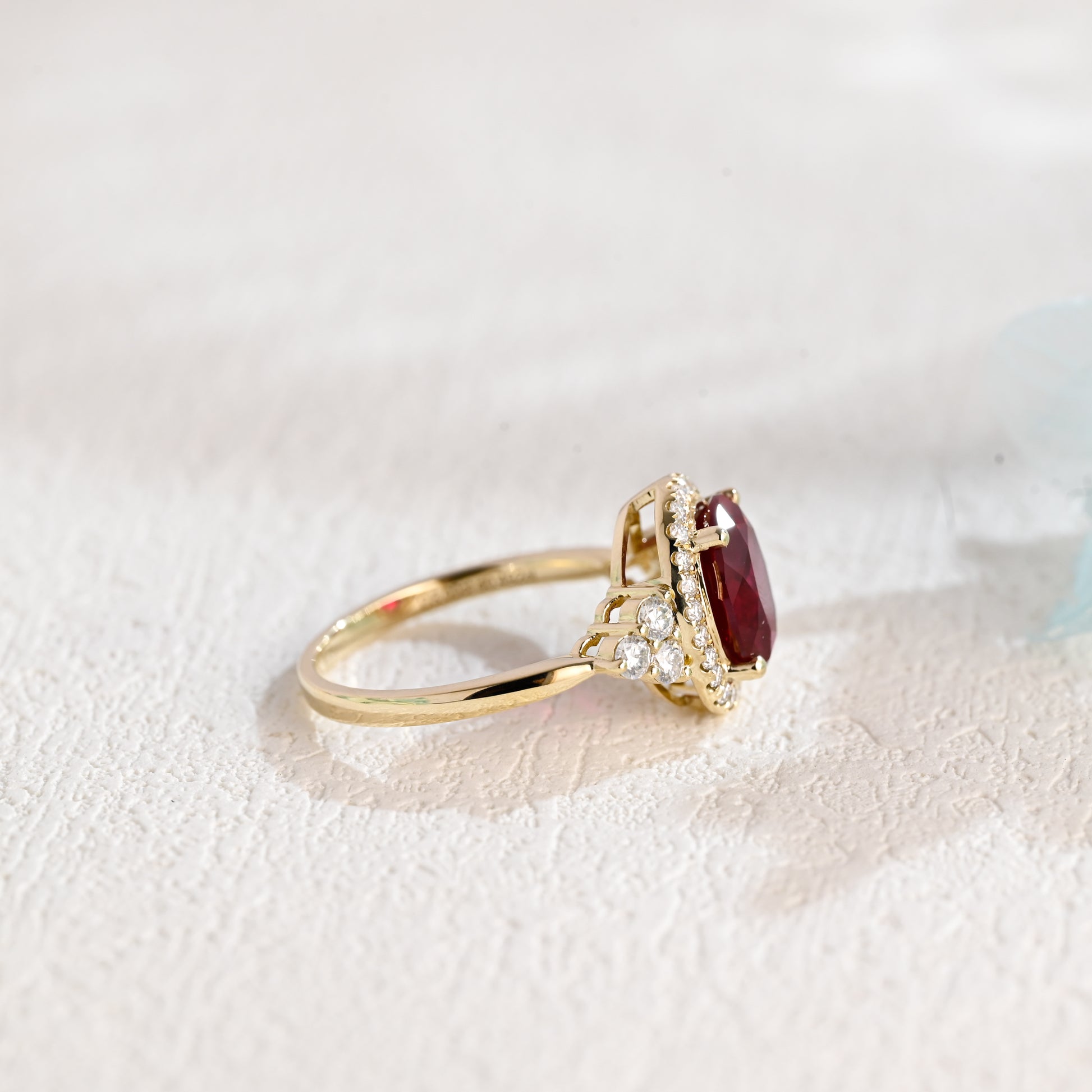 solid-gold-oval-cut-lab-grown-ruby-engagement-ring