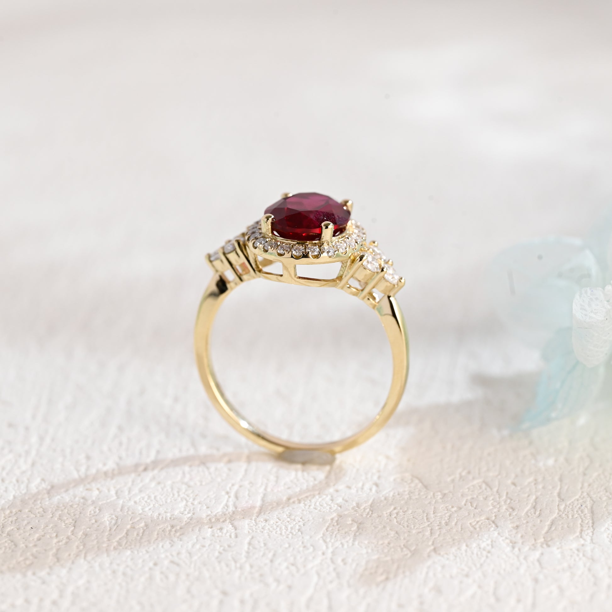 solid-gold-oval-cut-lab-grown-ruby-engagement-ring