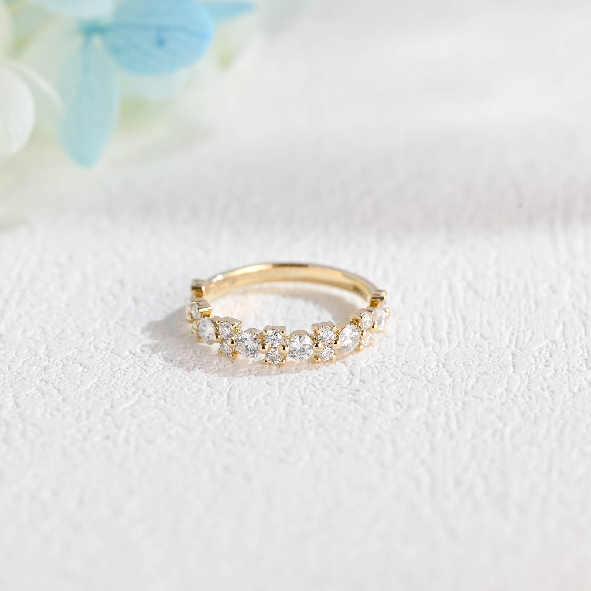 solid-gold-round-cut-moissanite-wedding-band