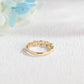 solid-gold-round-cut-moissanite-wedding-band