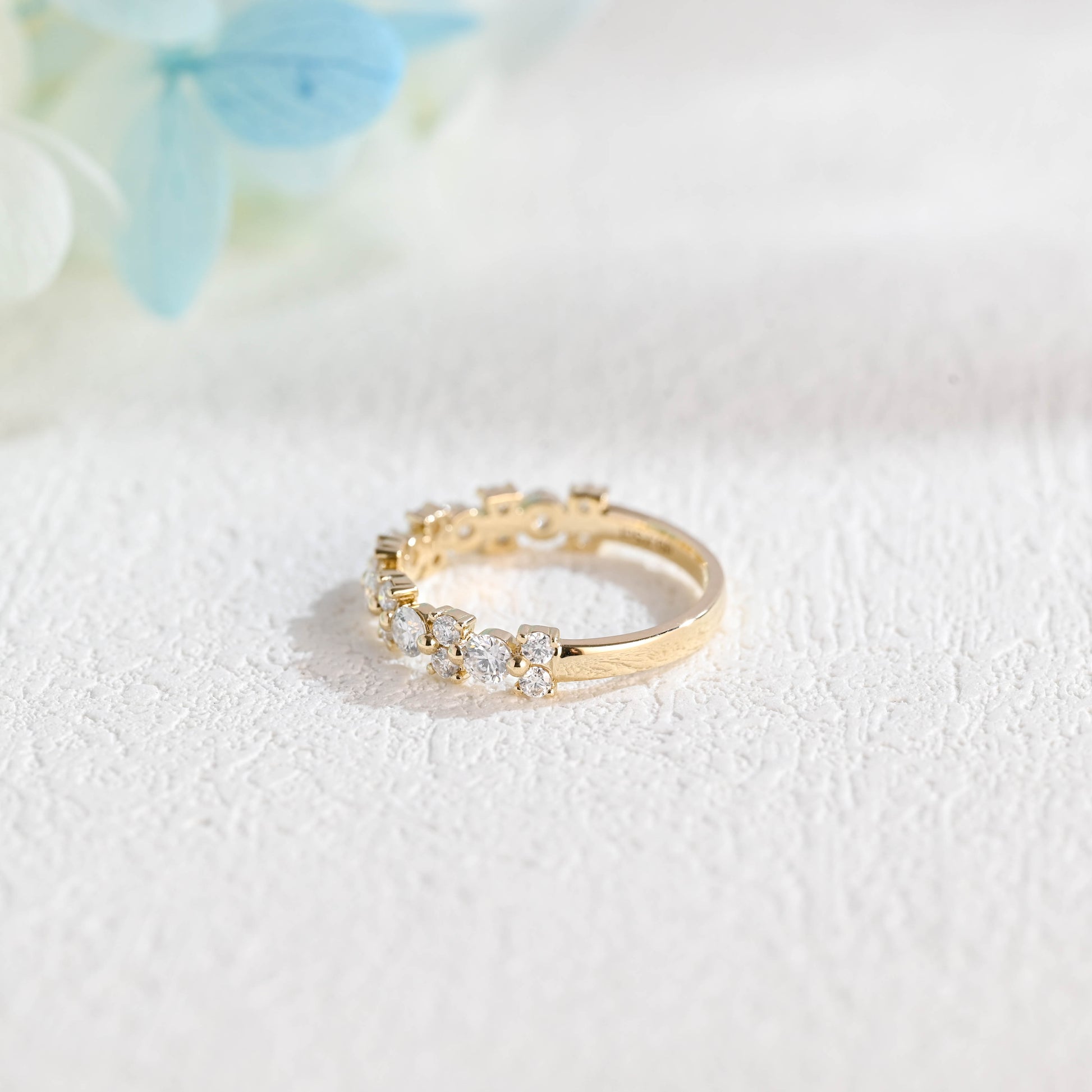 solid-gold-round-cut-moissanite-wedding-band