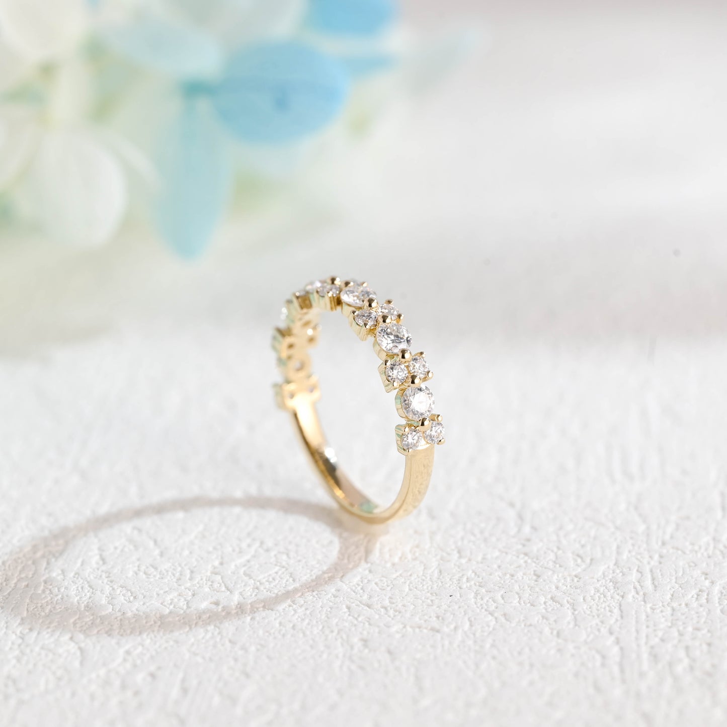 solid-gold-round-cut-moissanite-wedding-band