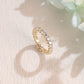 round-cut-moissanite-wedding-band-full-eternity-ring