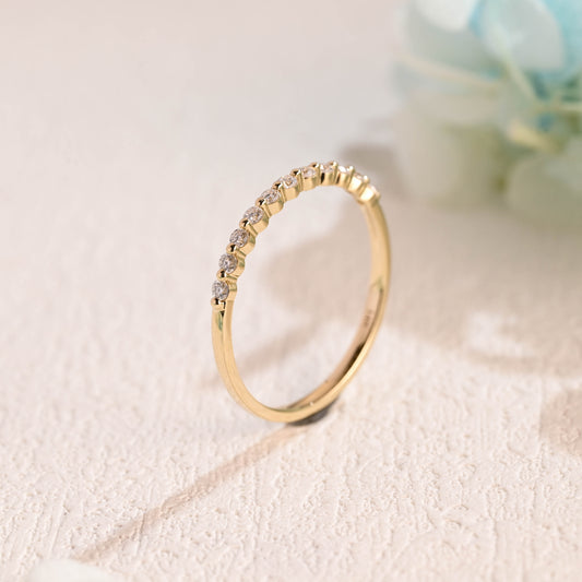 Solid-gold-round-moissanite-ring-band-half-eternity-band