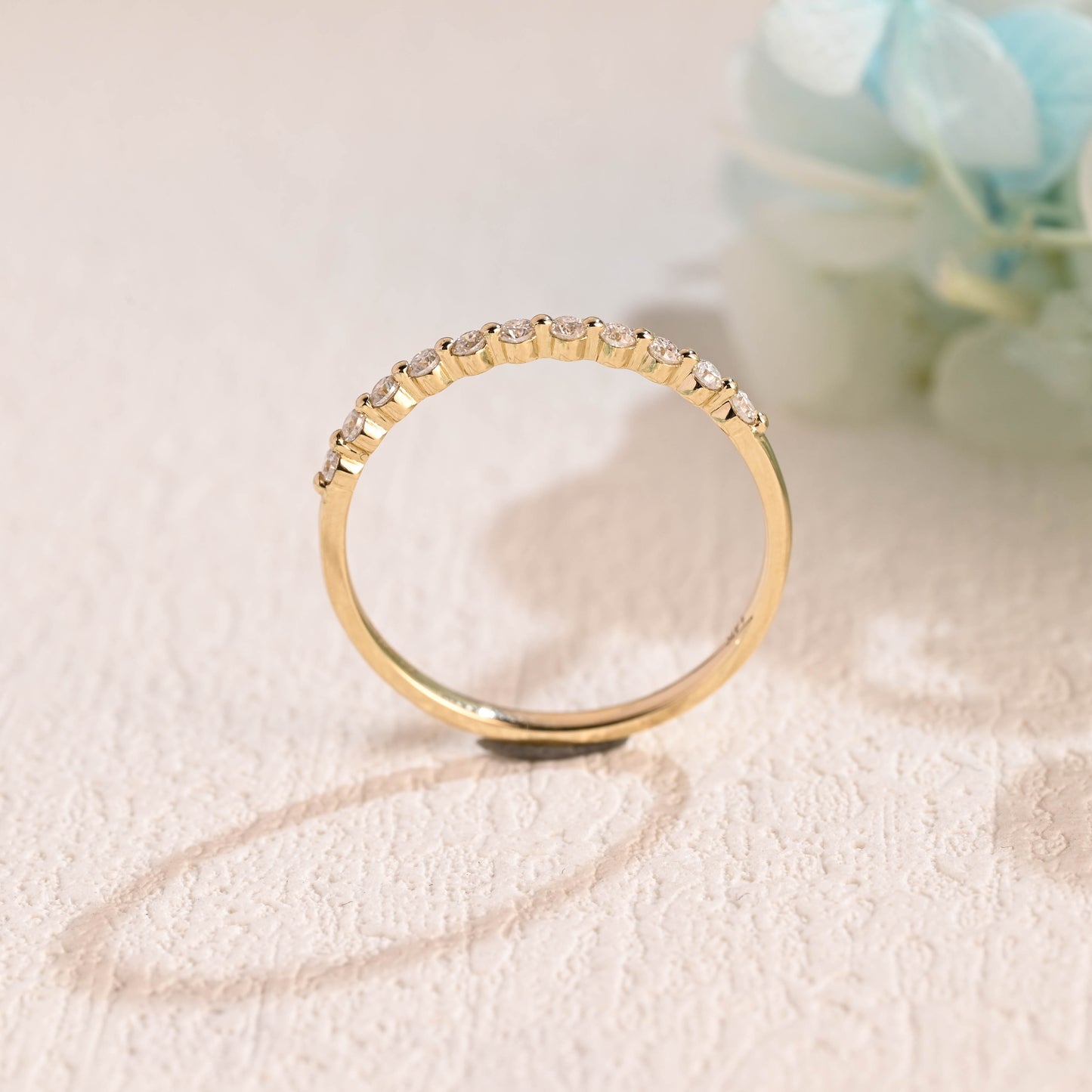 Solid-gold-round-moissanite-ring-band-half-eternity-wedding-band