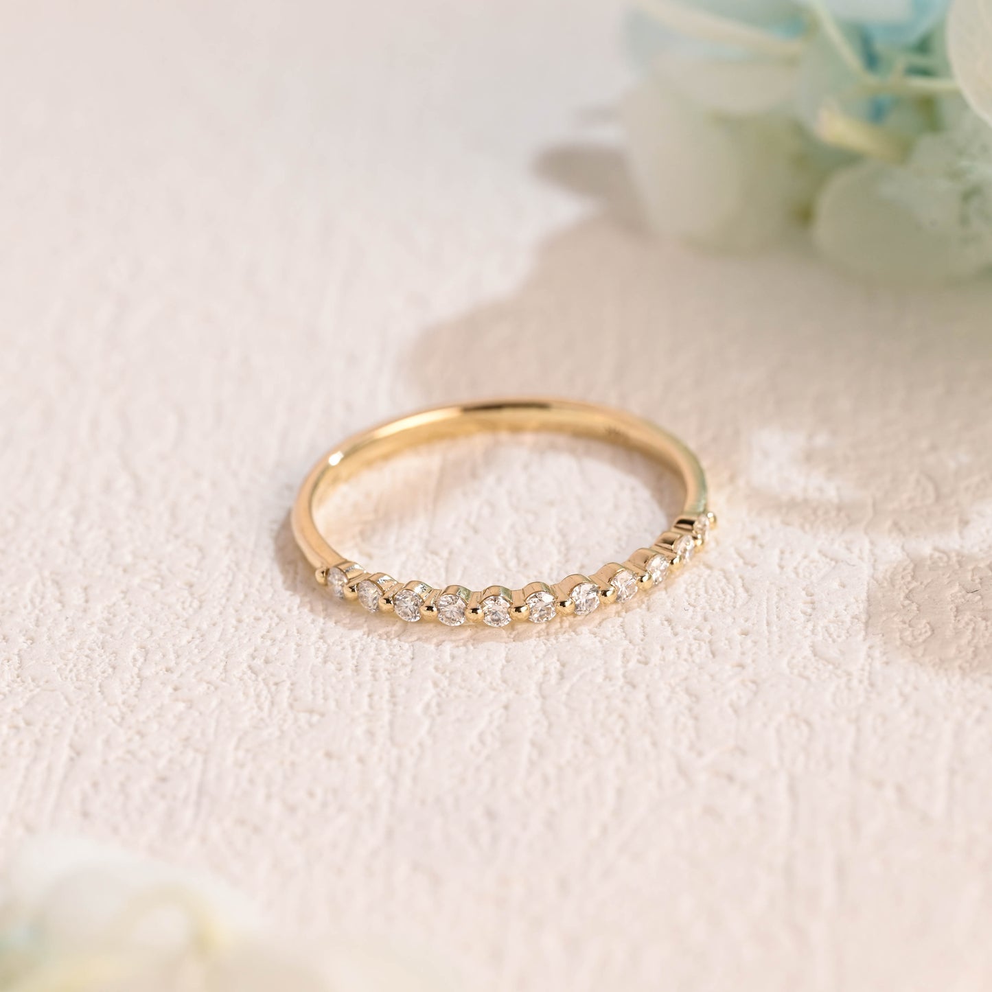 Solid-gold-round-moissanite-ring-band-half-eternity-wedding-band