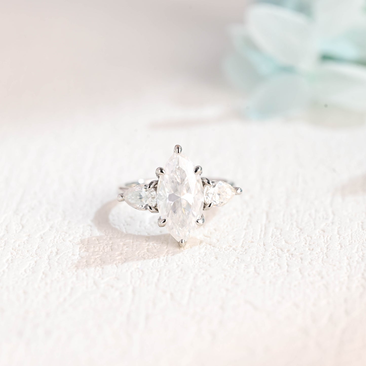 marquise-cut-moissanite-engagement-ring-three-stone-wedding-ring