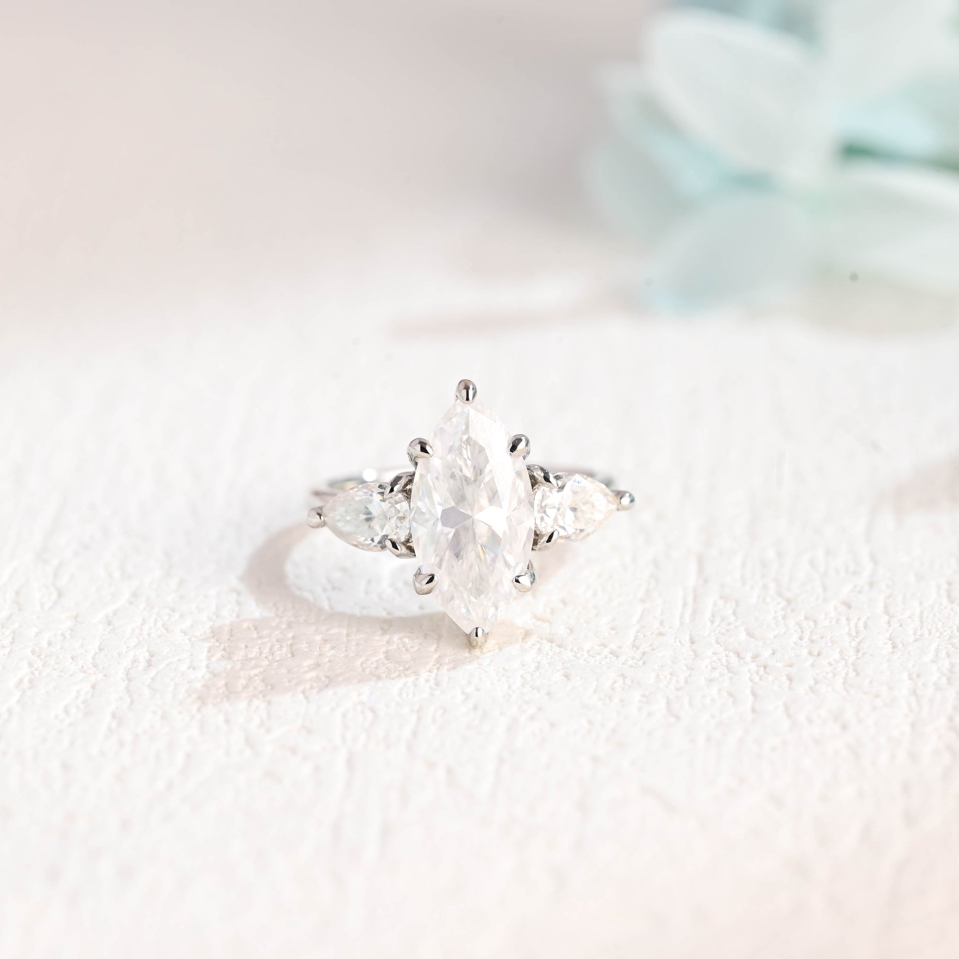 marquise-cut-moissanite-engagement-ring-three-stone-wedding-ring