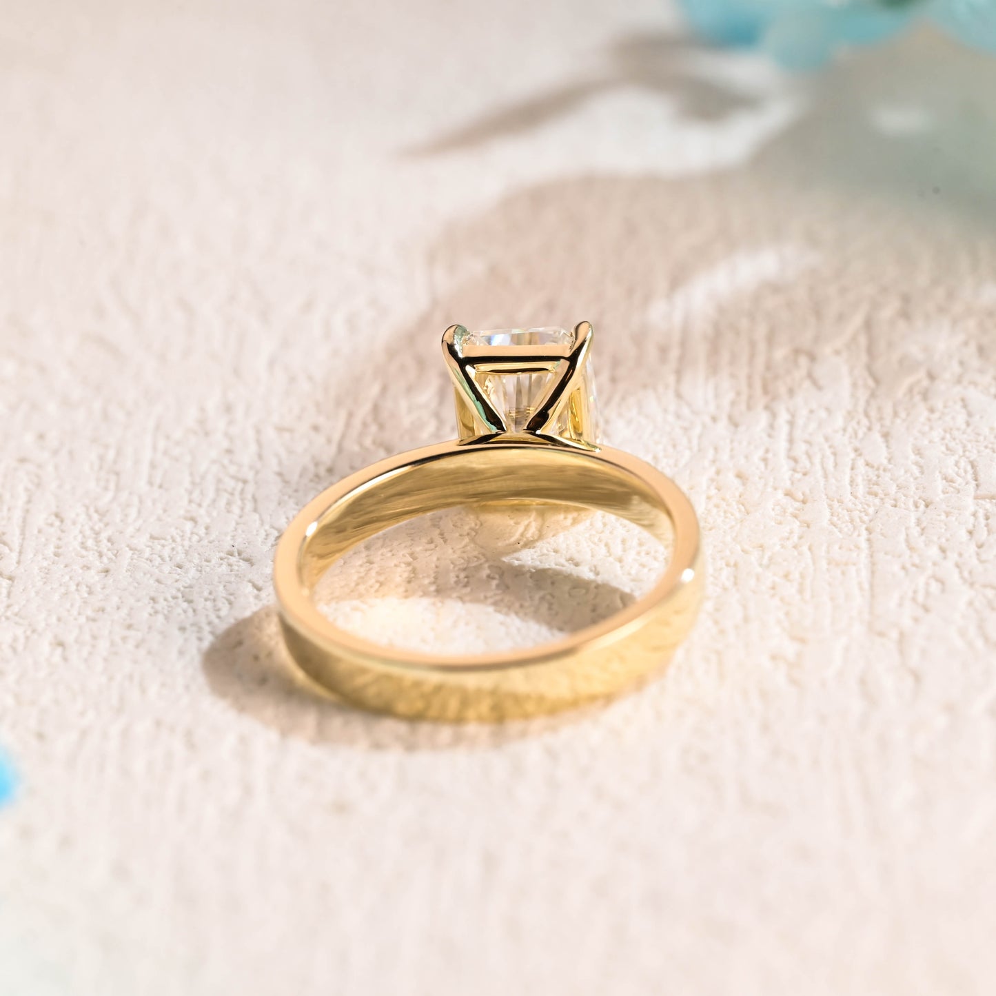 solid-gold-solitaire-radiant-cut-moissanite-engagement-ring