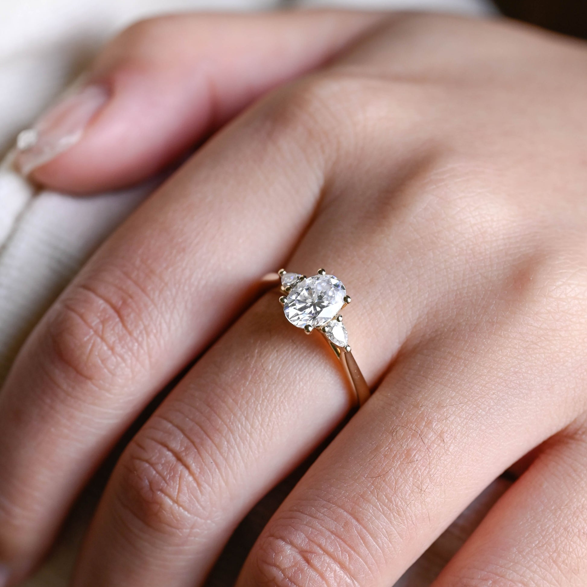 three-stone-oval-cut-moissanite-engagement-ring