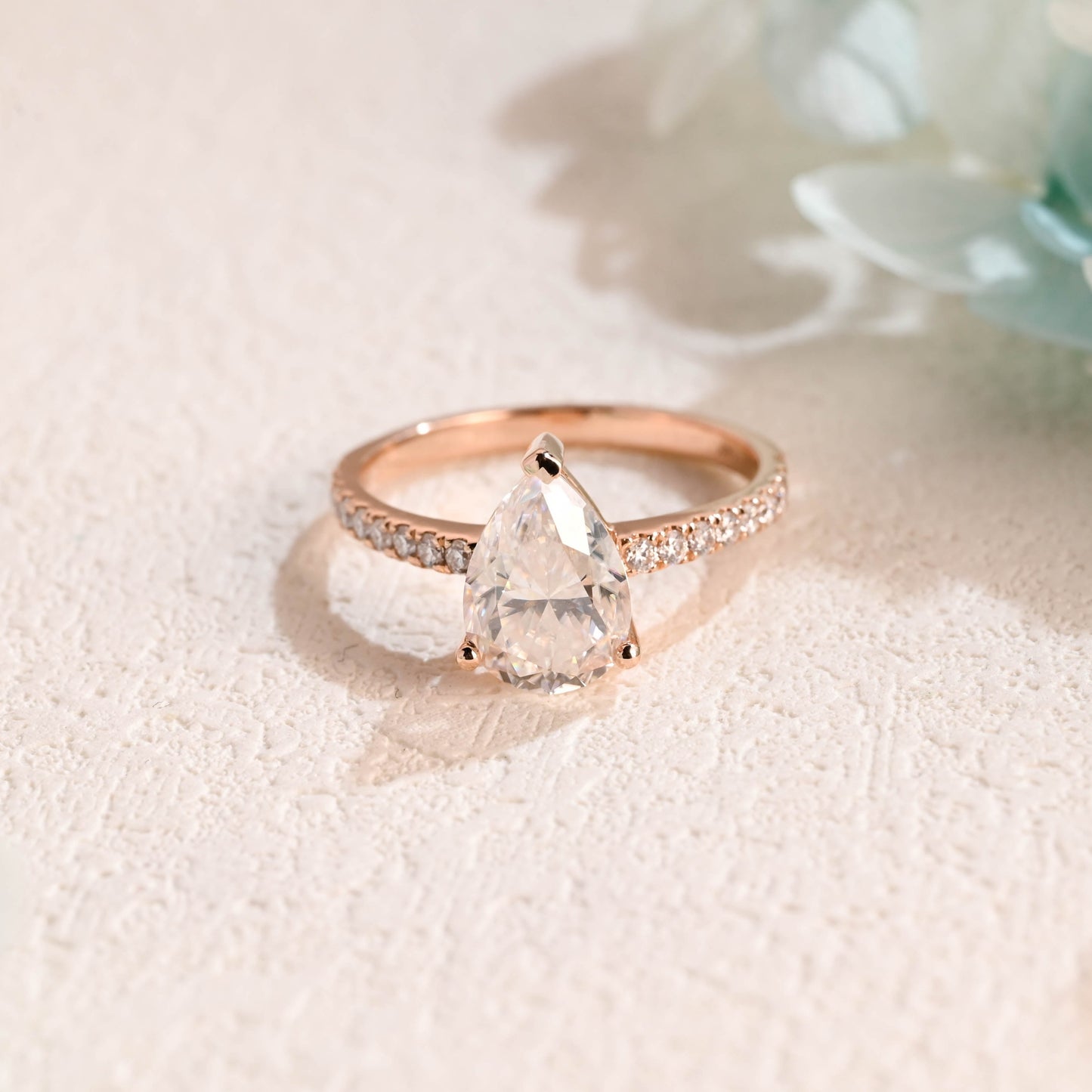 half-pave-pear-moissanite-ring-engagement-ring