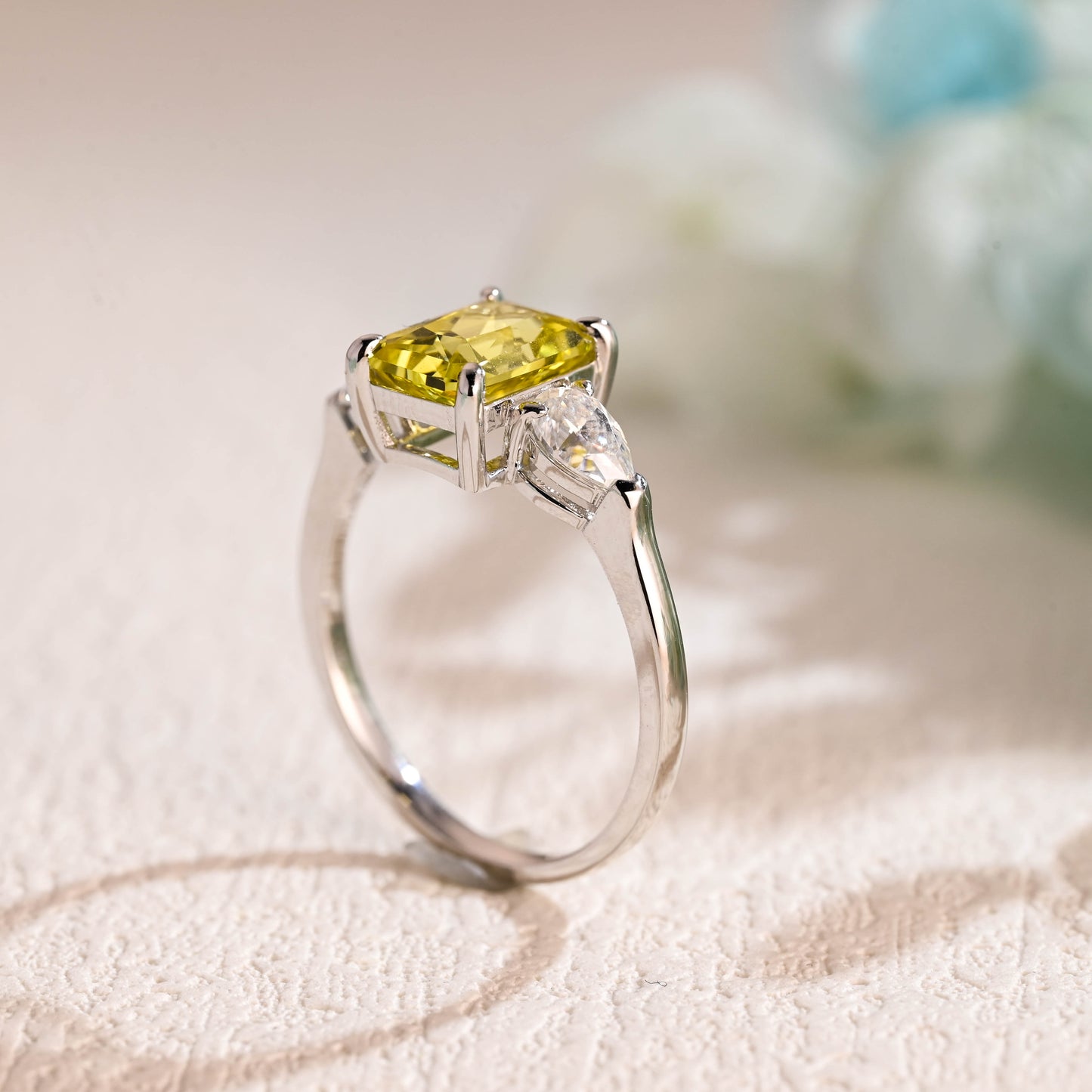 solid-gold-radiant-cut-pear-cut-three-stone-ring