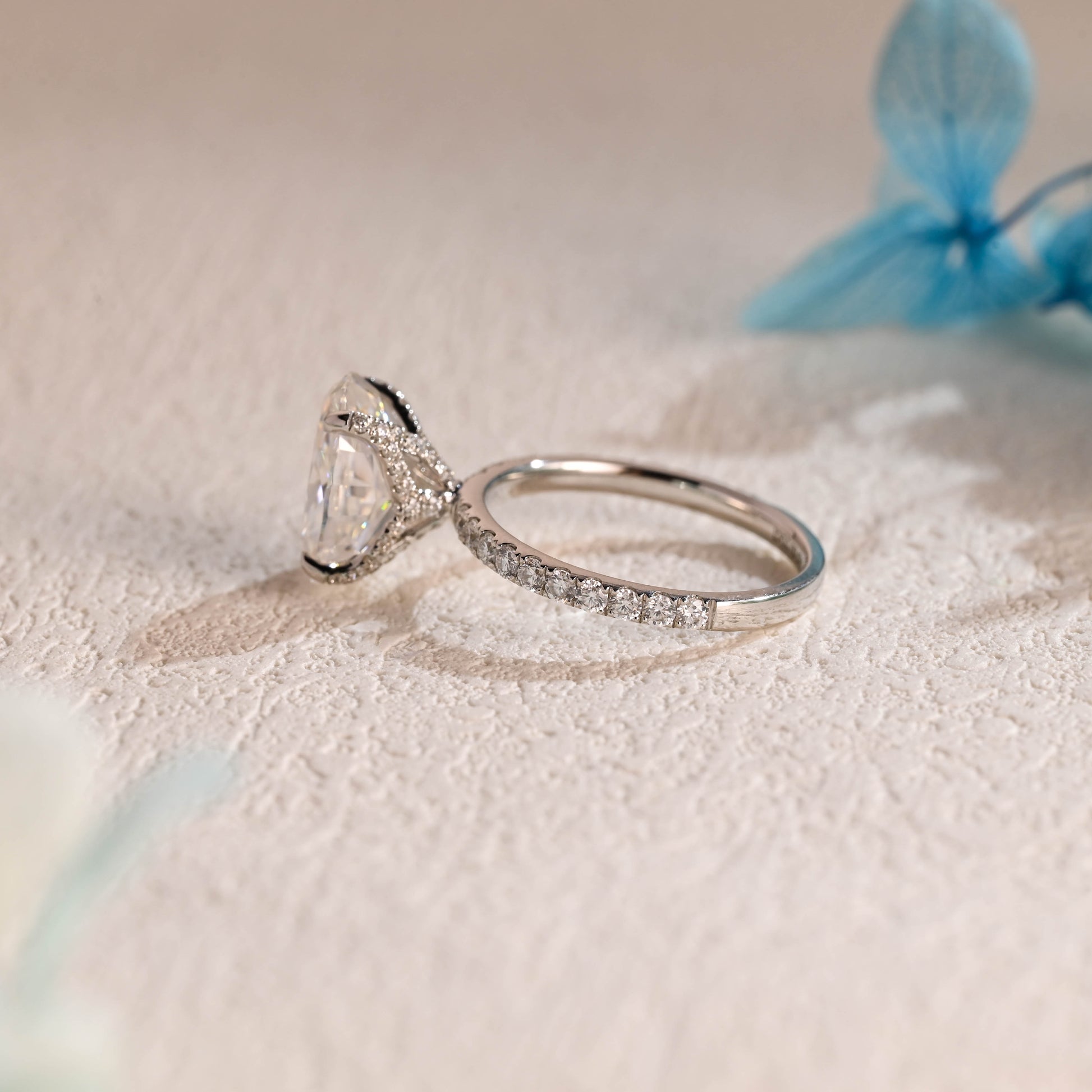 floral-inspired-oval-moissanite-engagement-ring-half-eternity-proposal-ring