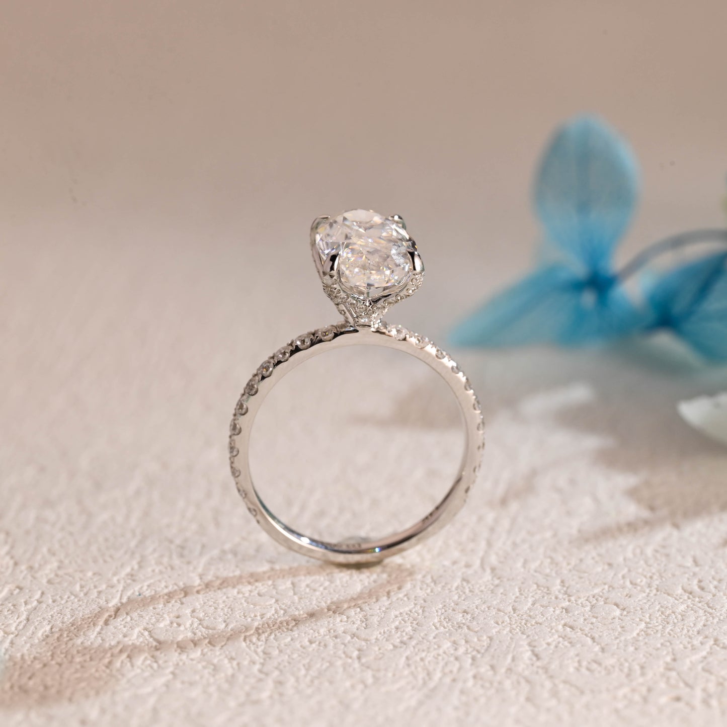 floral-inspired-oval-moissanite-engagement-ring-half-eternity-proposal-ring