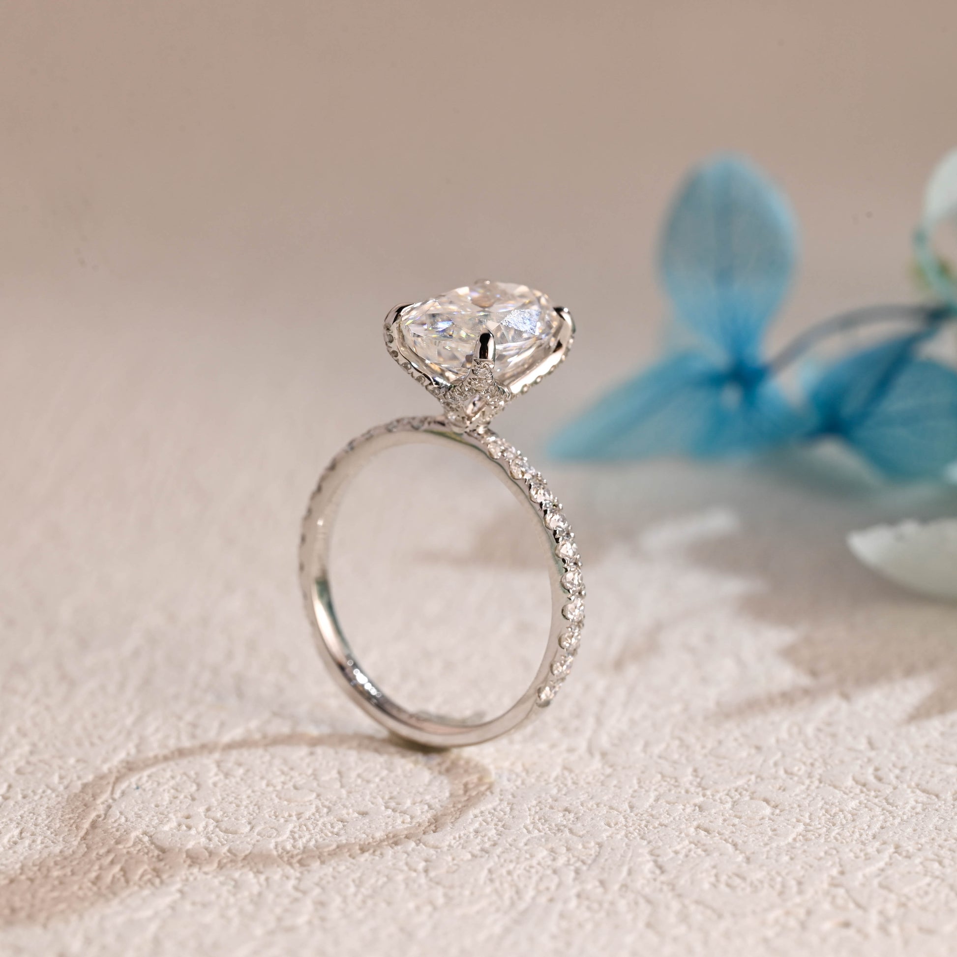 floral-inspired-oval-moissanite-engagement-ring-half-eternity-proposal-ring