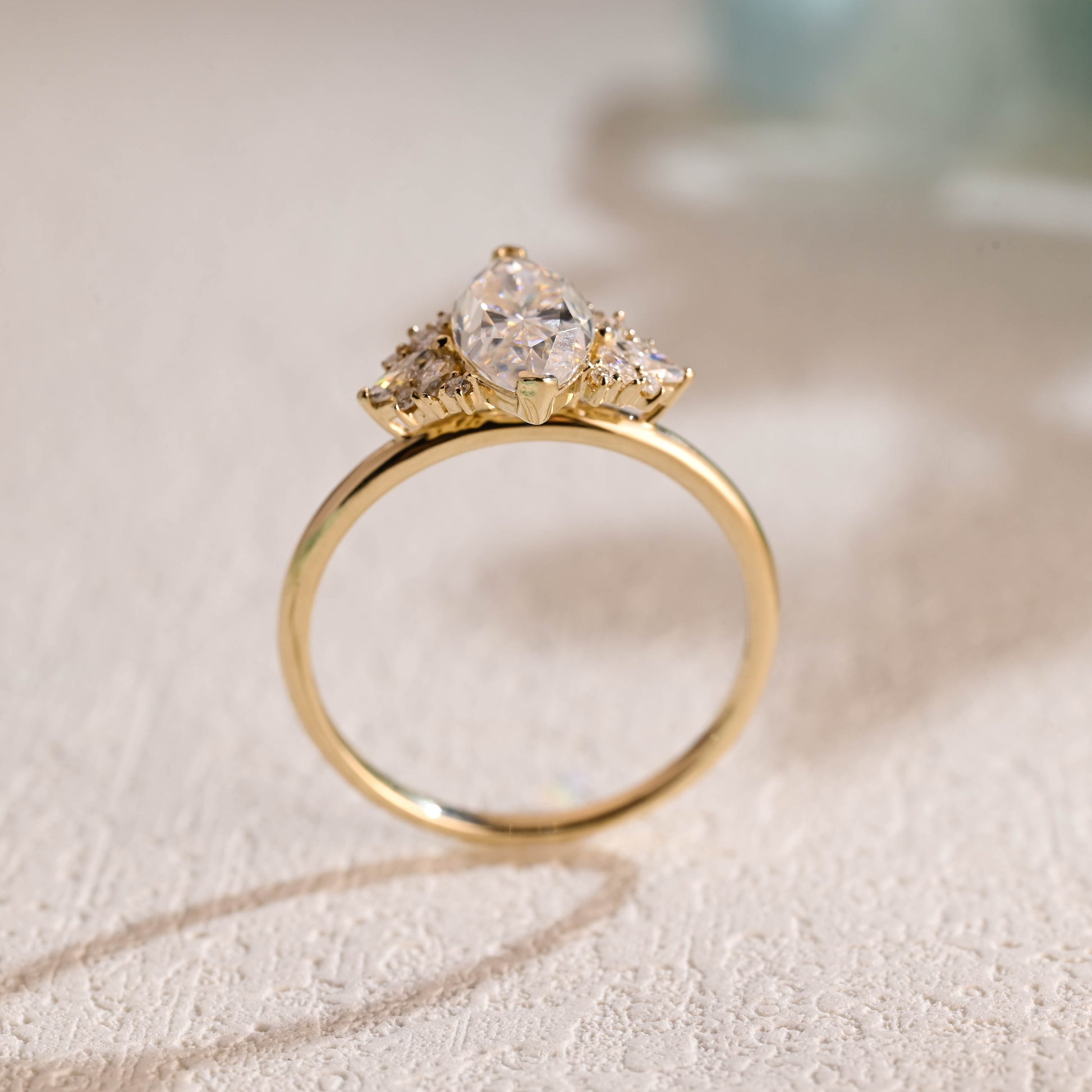 solid-gold-marquise-cut-moissanite-engagement-ring-cluster-ring