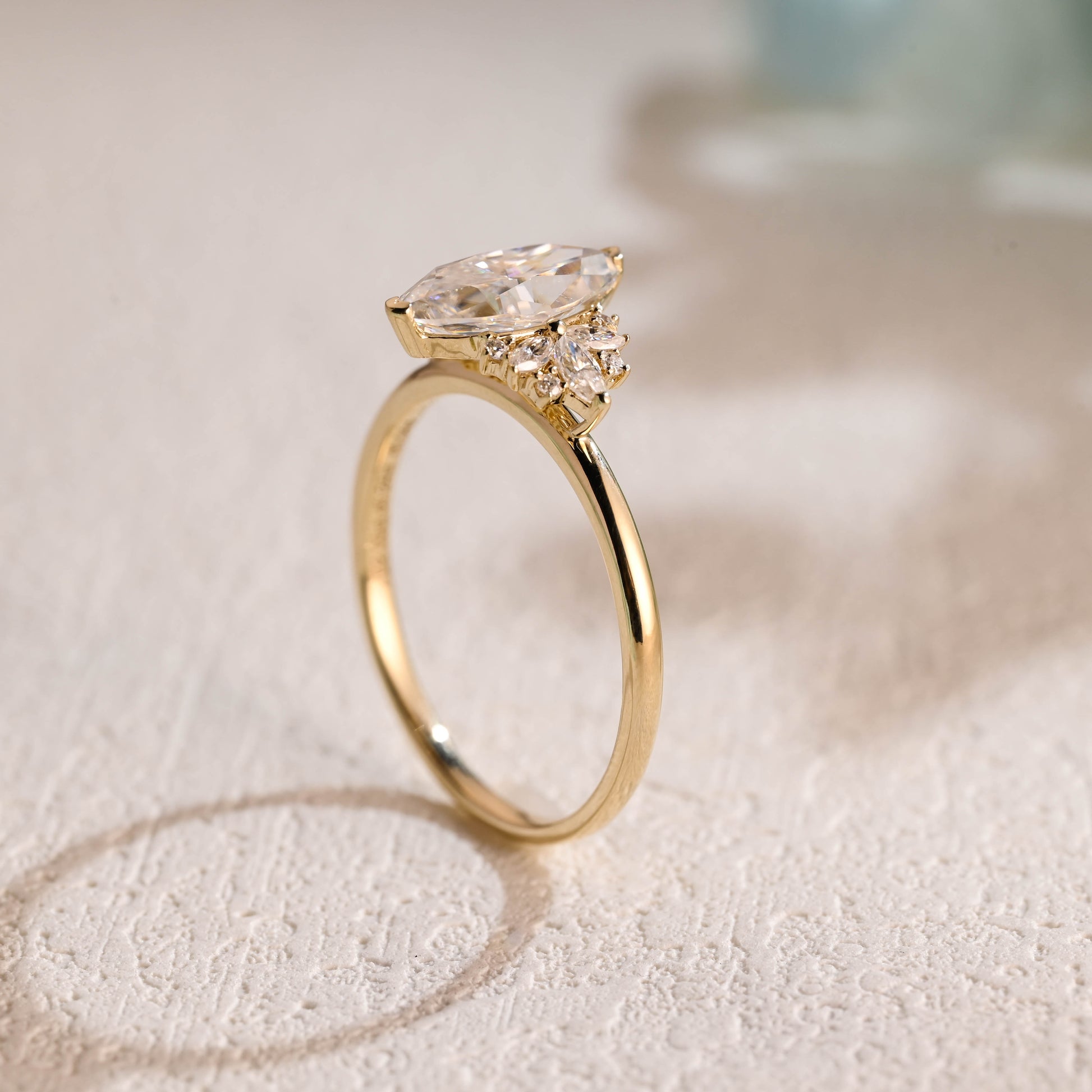 solid-gold-marquise-cut-moissanite-engagement-ring-cluster-ring