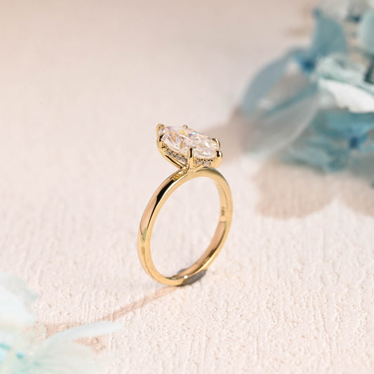 solid-gold-marquise-cut-moissanite-engagement-ring-hidden-halo