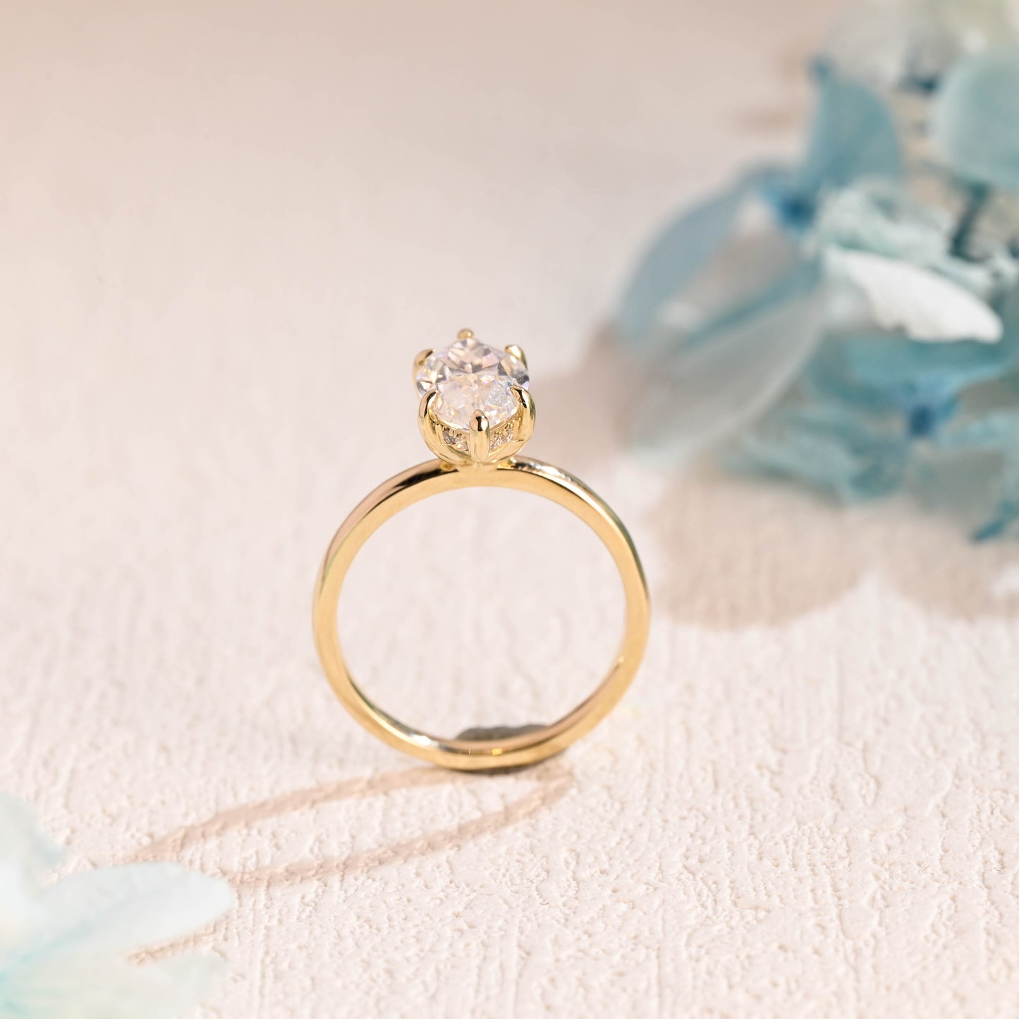 solid-gold-marquise-cut-moissanite-engagement-ring-hidden-halo