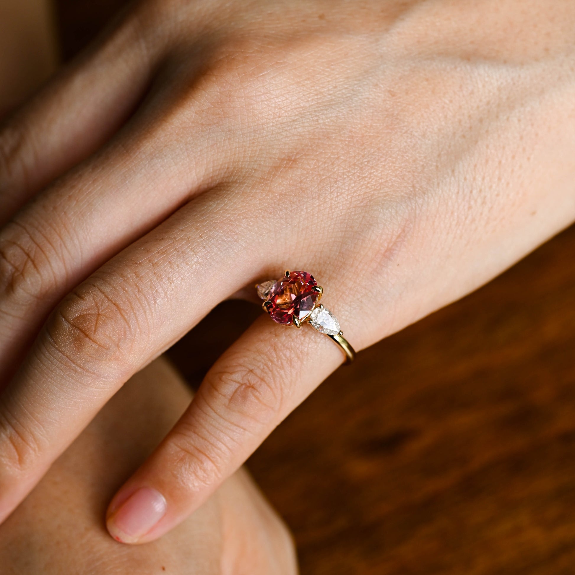 solid-gold-three-stone-ring-oval-cut-sapphire-ring-pear-cut-ring