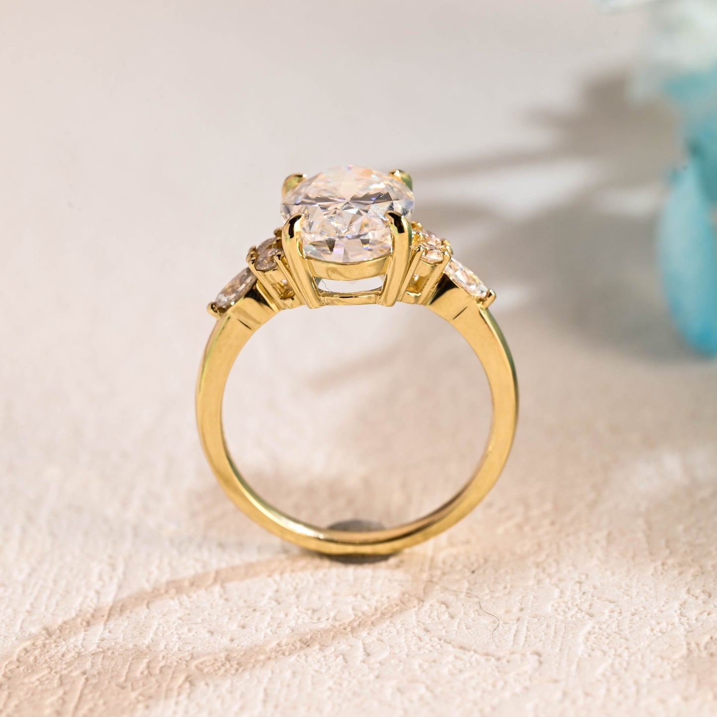 solid-gold-cluster-oval-moissanite-engagement-ring