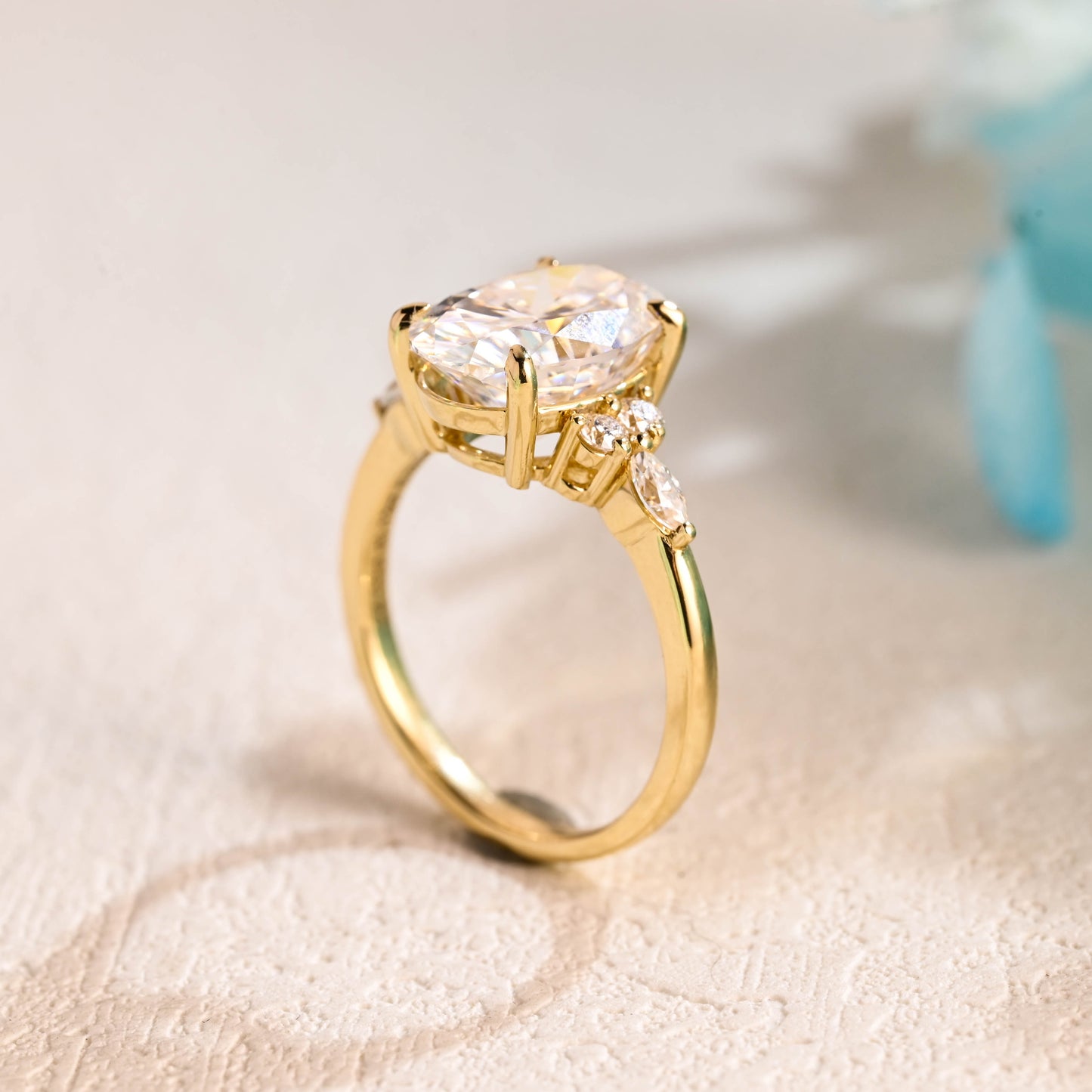 solid-gold-cluster-oval-moissanite-engagement-ring