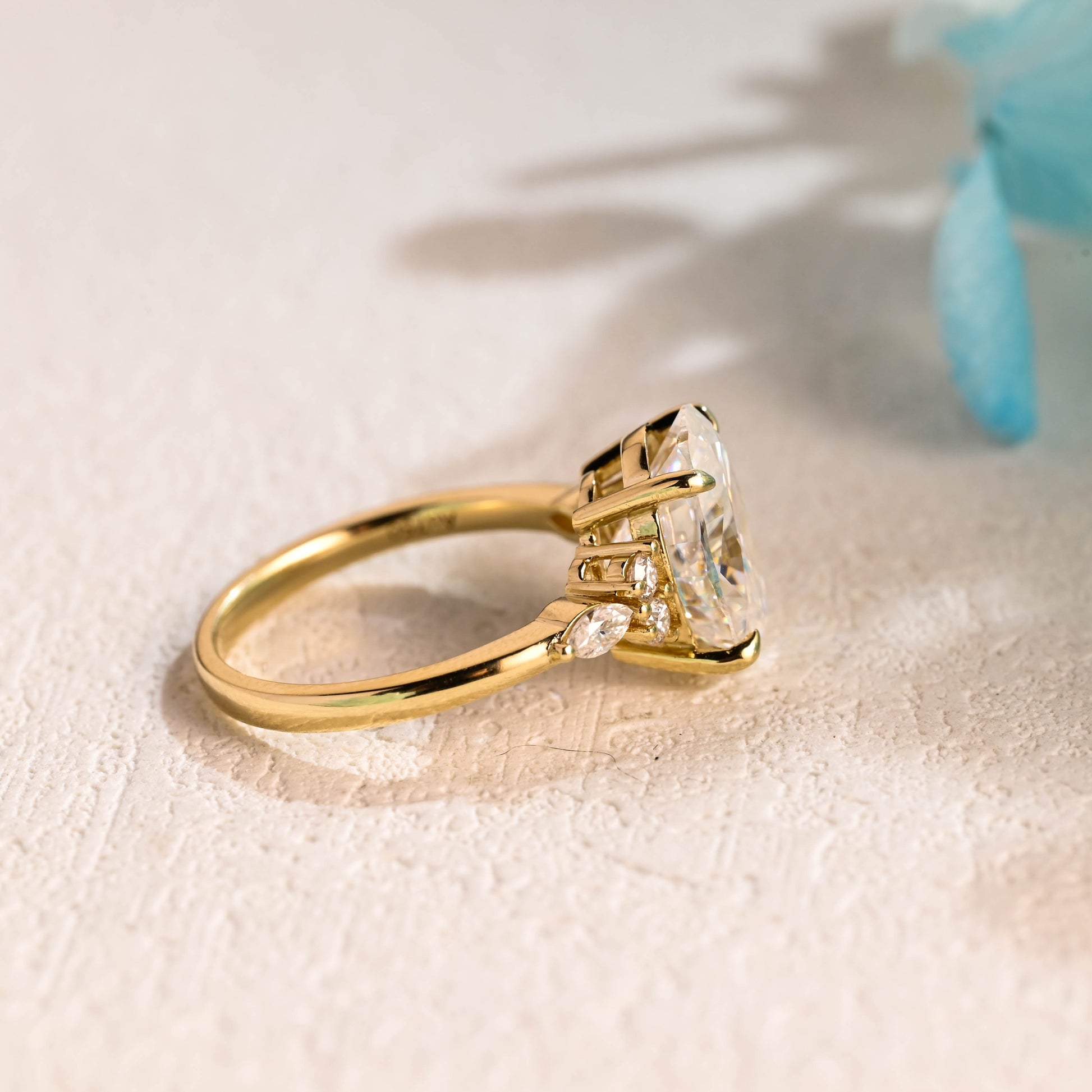 solid-gold-cluster-oval-moissanite-engagement-ring