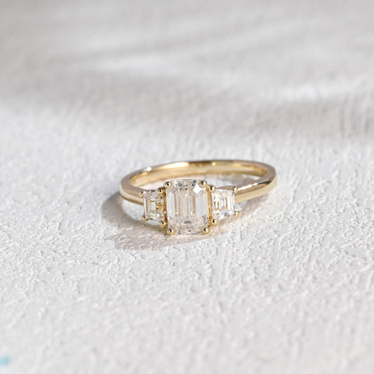 solid-gold-emerald-cut-moissanite-engagement-ring-three-stone-ring