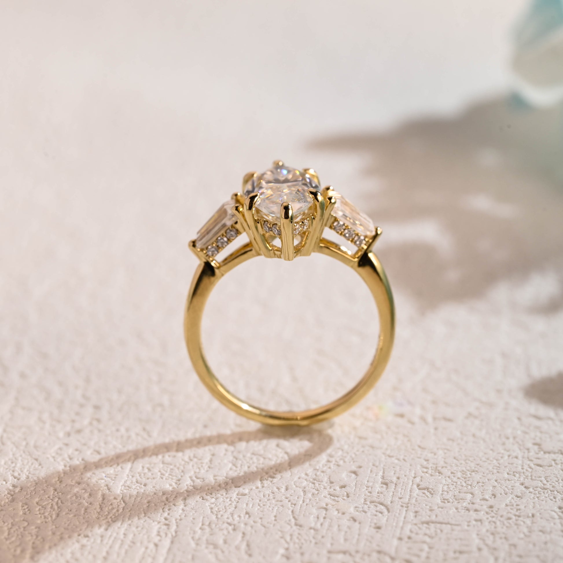 solid-gold-marquise-cut-moissanite-engagement-ring-three-stone-ring