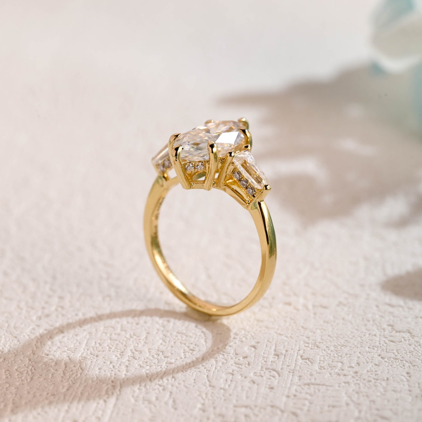 solid-gold-marquise-cut-moissanite-engagement-ring-three-stone-ring