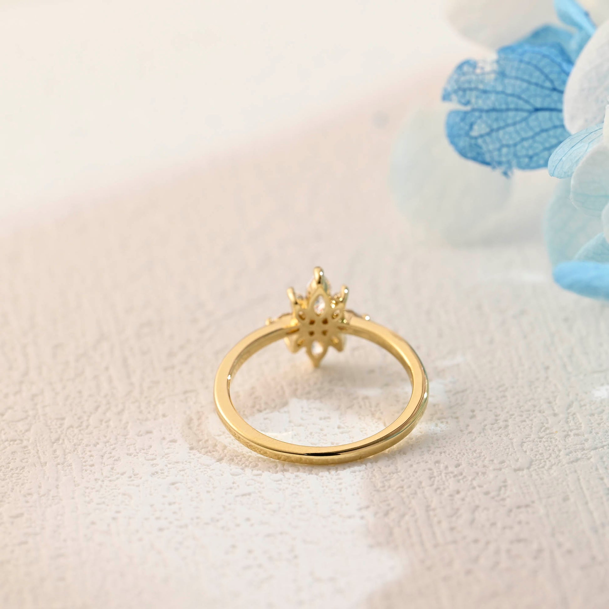 solid-gold-marquise-cut-moissanite-ring-cluster-ring