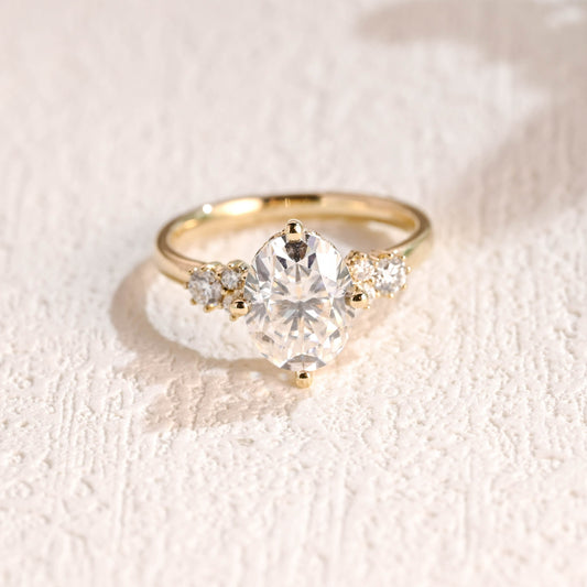 oval-moissanite-engagement-ring-with-side-stones