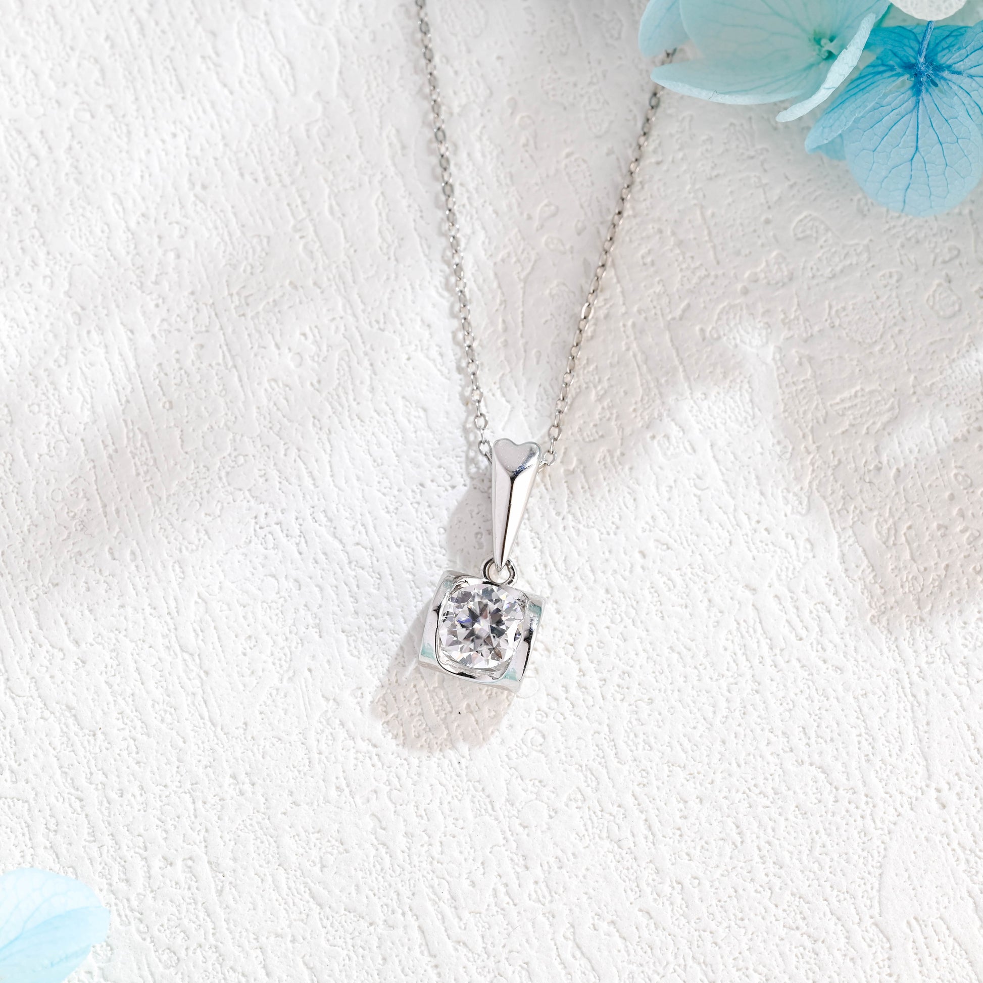 bezel-round-cut-moissanite-pendant-heart-shaped-necklace