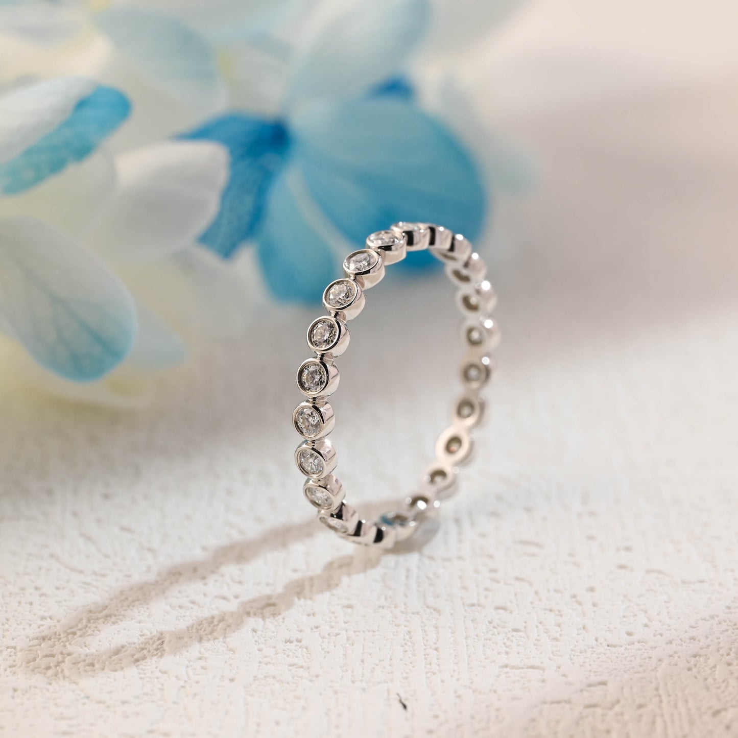 solid-gold-round-cut-moissanite-wedding-ring-full-eternity-wedding-band-bezel-ring