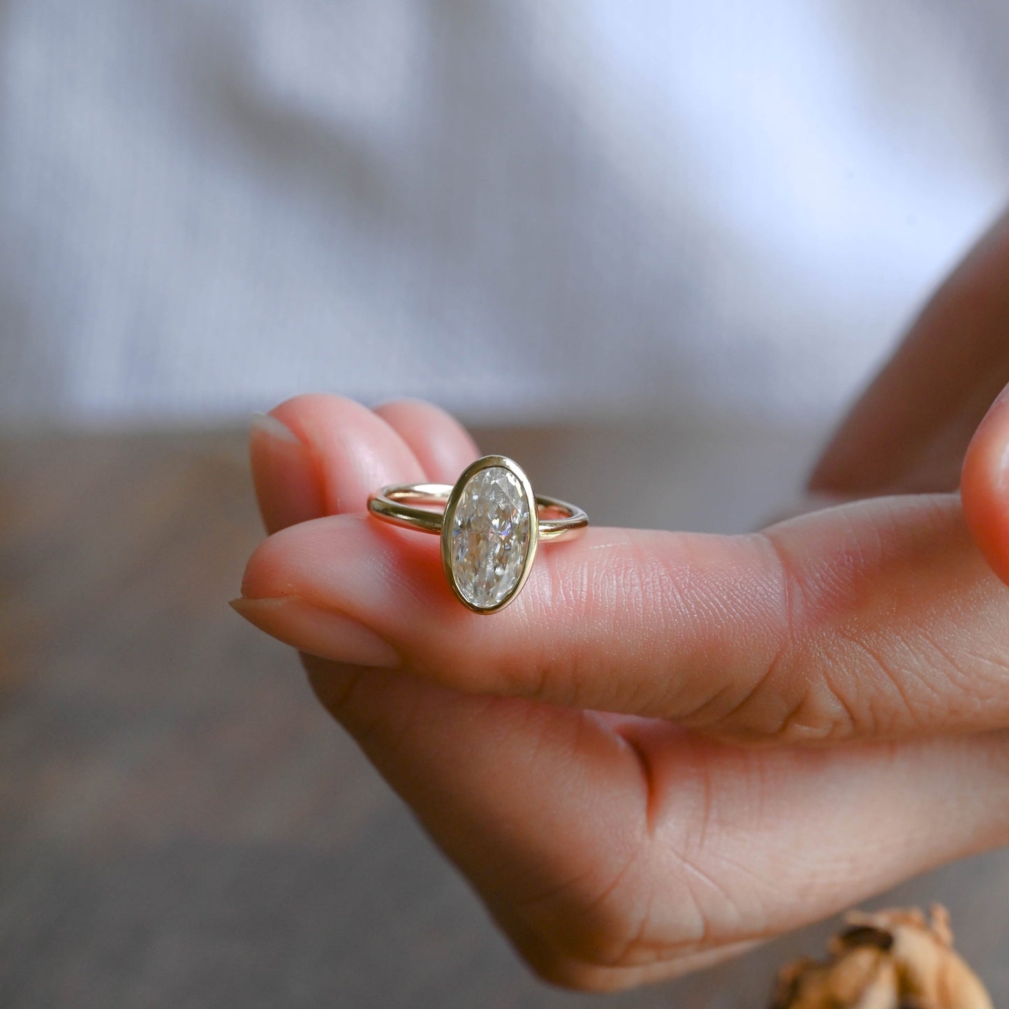 CausYou oval cut moissanite engagement ring Solid Gold Bezel Crushed Ice Elongated Oval Cut Moissanite Engagement Ring