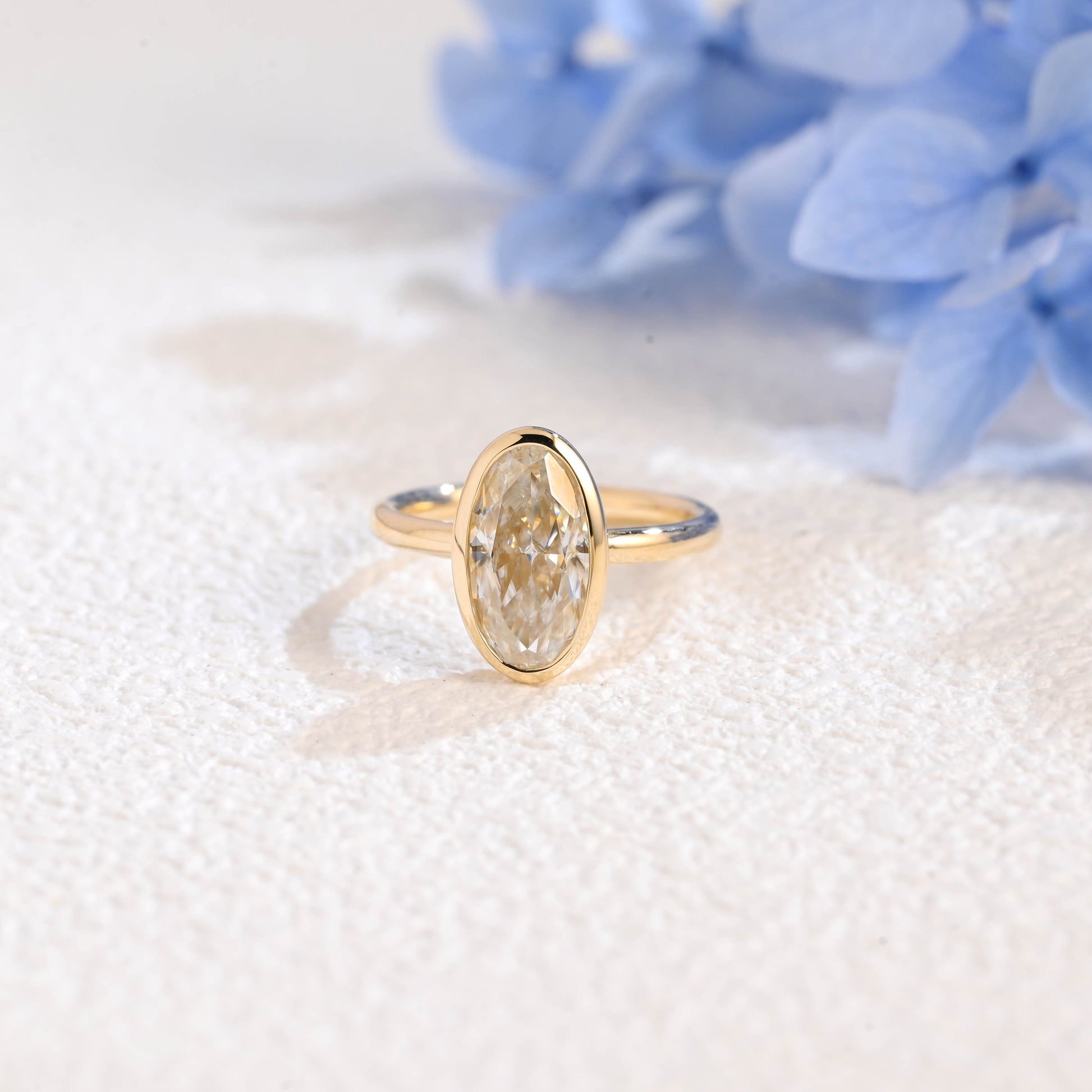 CausYou oval cut moissanite engagement ring Solid Gold Bezel Crushed Ice Elongated Oval Cut Moissanite Engagement Ring