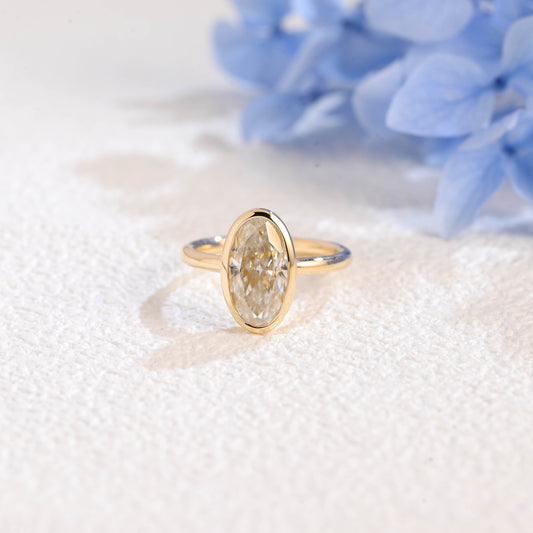 CausYou oval cut moissanite engagement ring Solid Gold Bezel Crushed Ice Elongated Oval Cut Moissanite Engagement Ring
