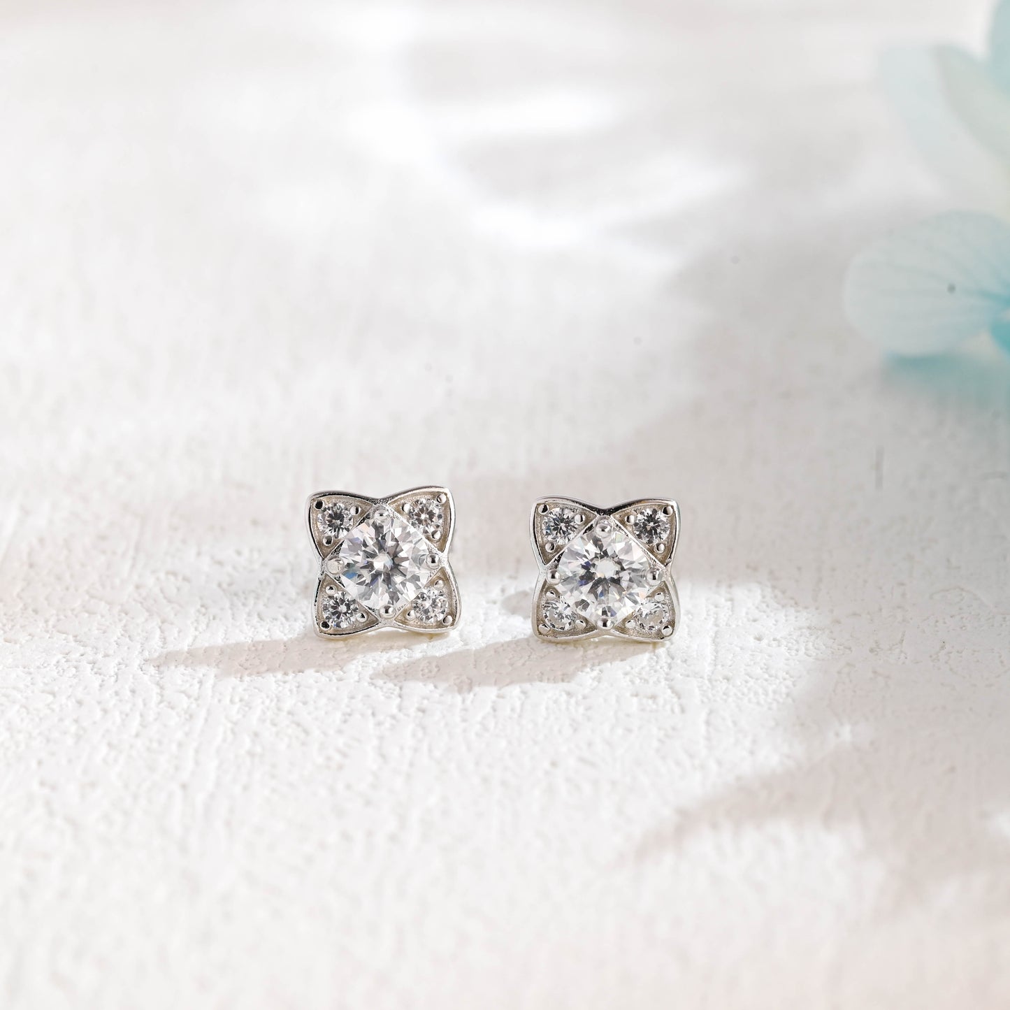 round-cut-four-leaf-clover-inspired-moissanite-earrings