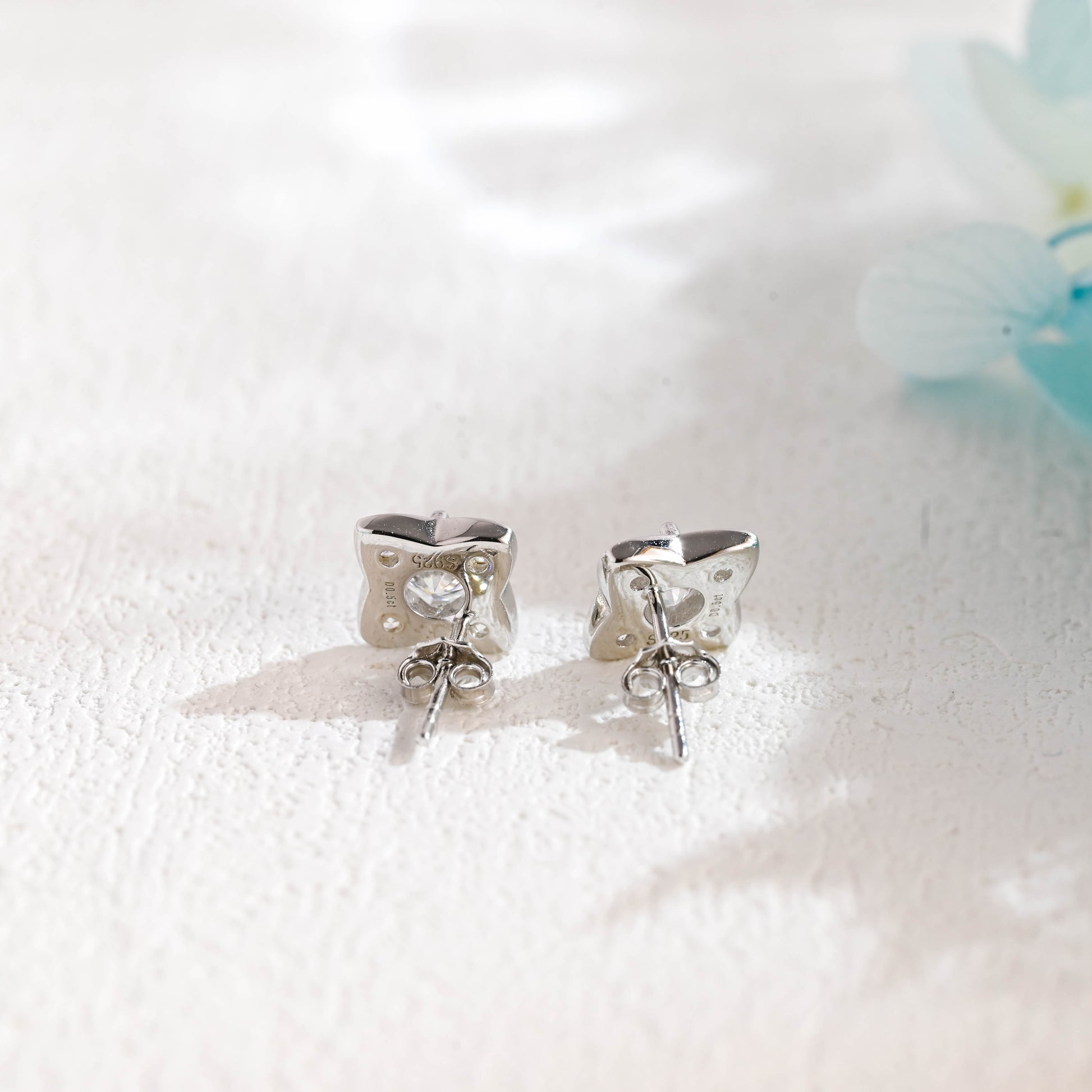 round-cut-four-leaf-clover-inspired-moissanite-earrings